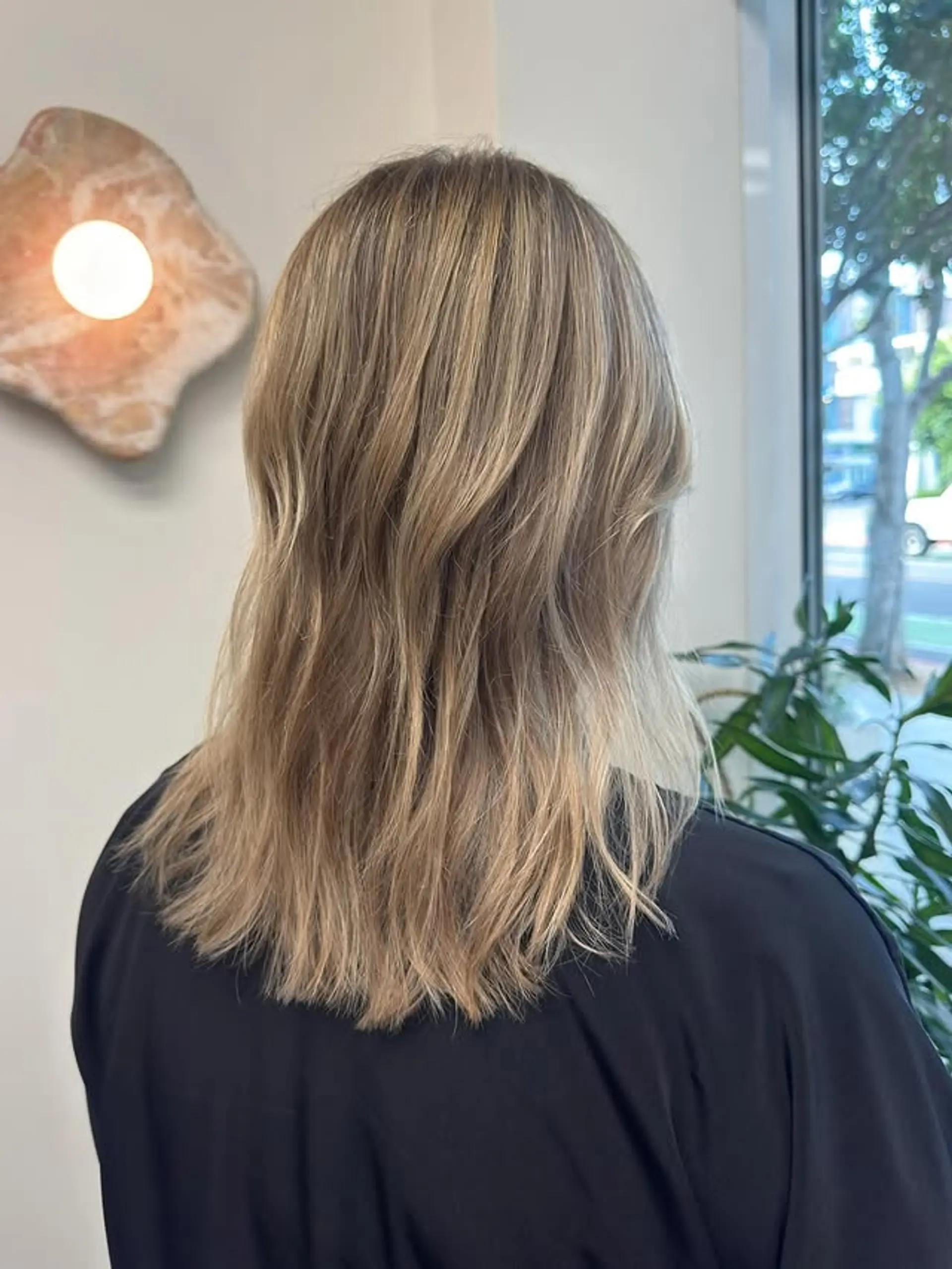A medium-length lob with a beachy blonde balayage. 1