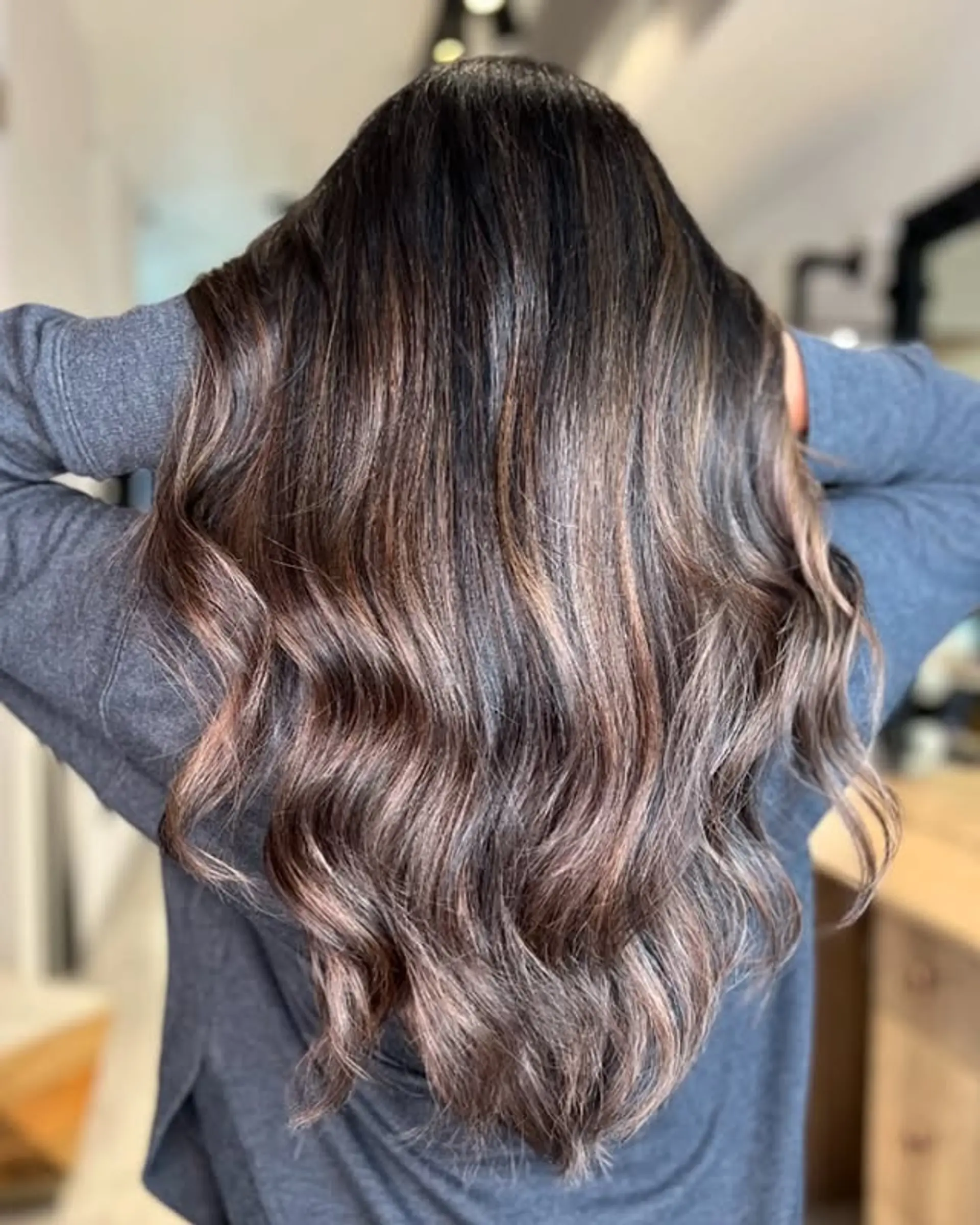 Long wavy hairstyle with a chocolate swirl balayage. 1