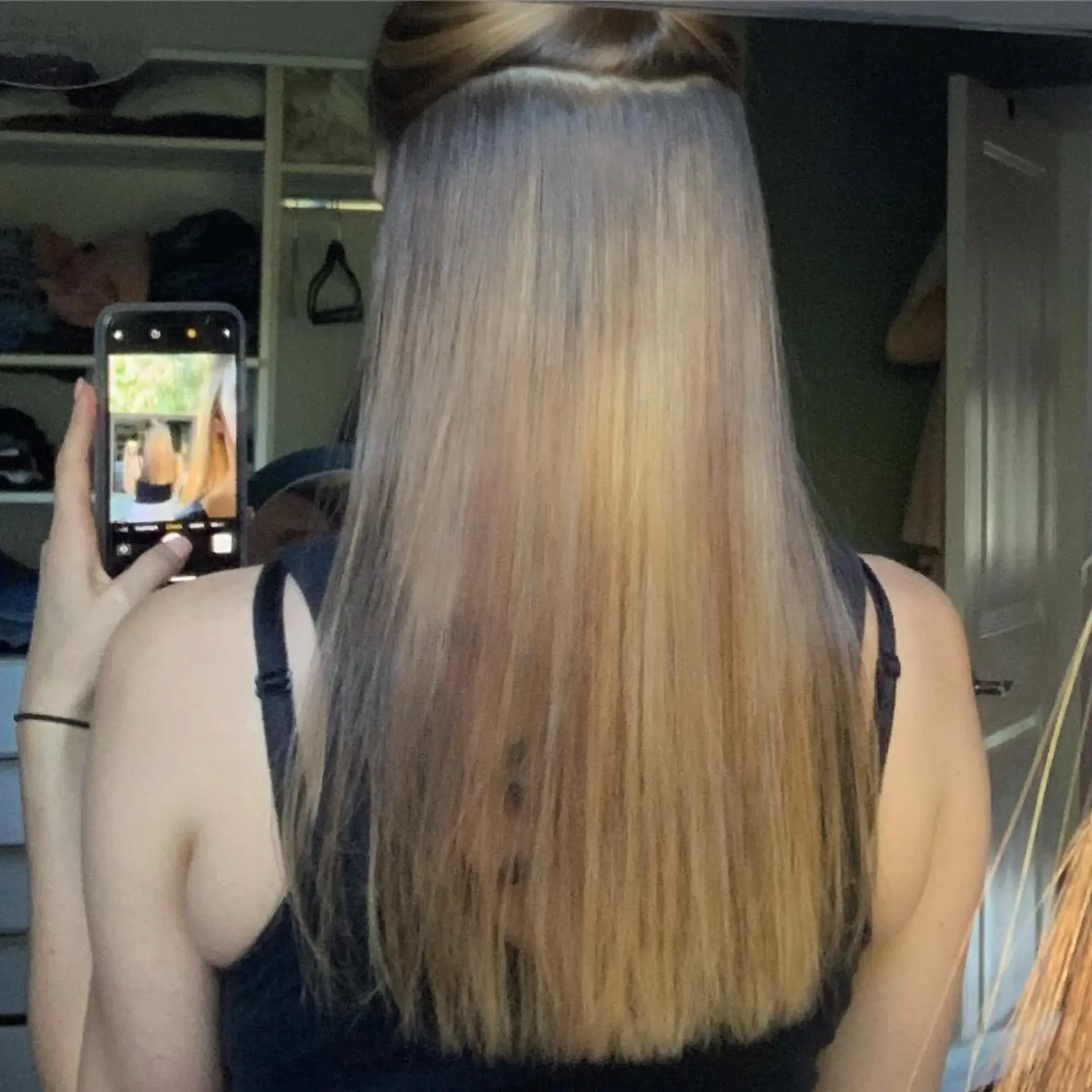 Long, straight blonde balayage with dark roots. 1