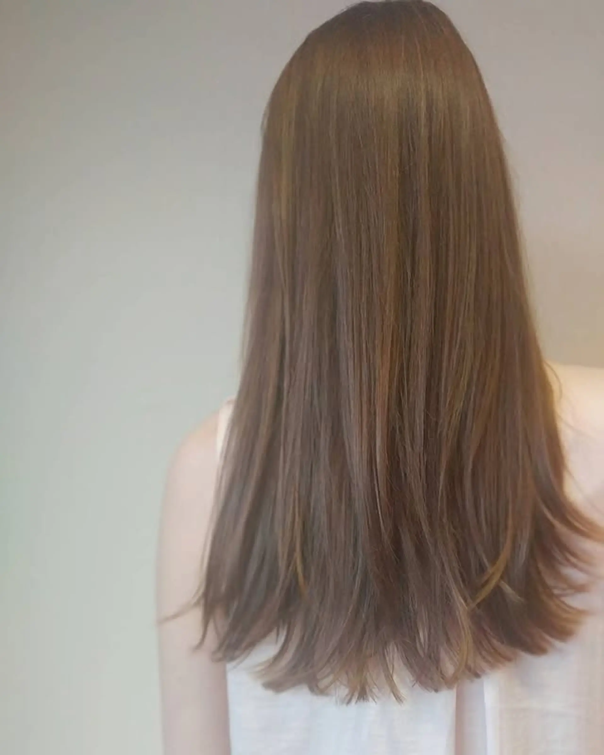 Long layered straight haircut. 1