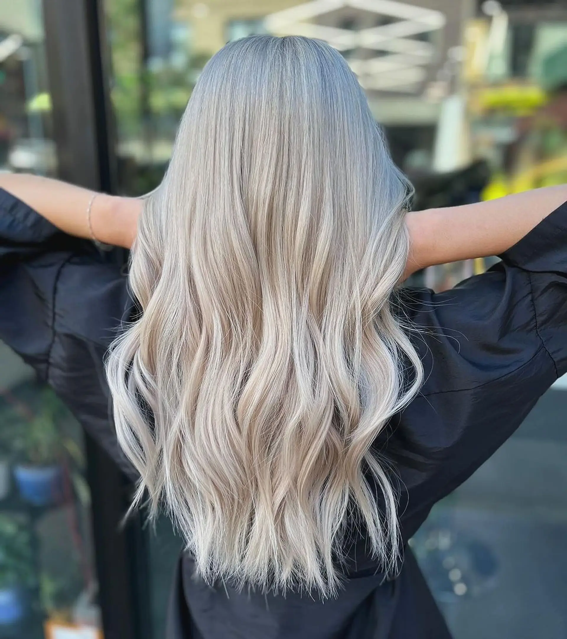 The Silver Cascade hairstyle features very long, wavy locks that flow down past the middle of the back. The hair color is a stunning platinum blonde with distinct silver tones, creating a luminous and elegant appearance.
Stylist - @xcellent_jason 1