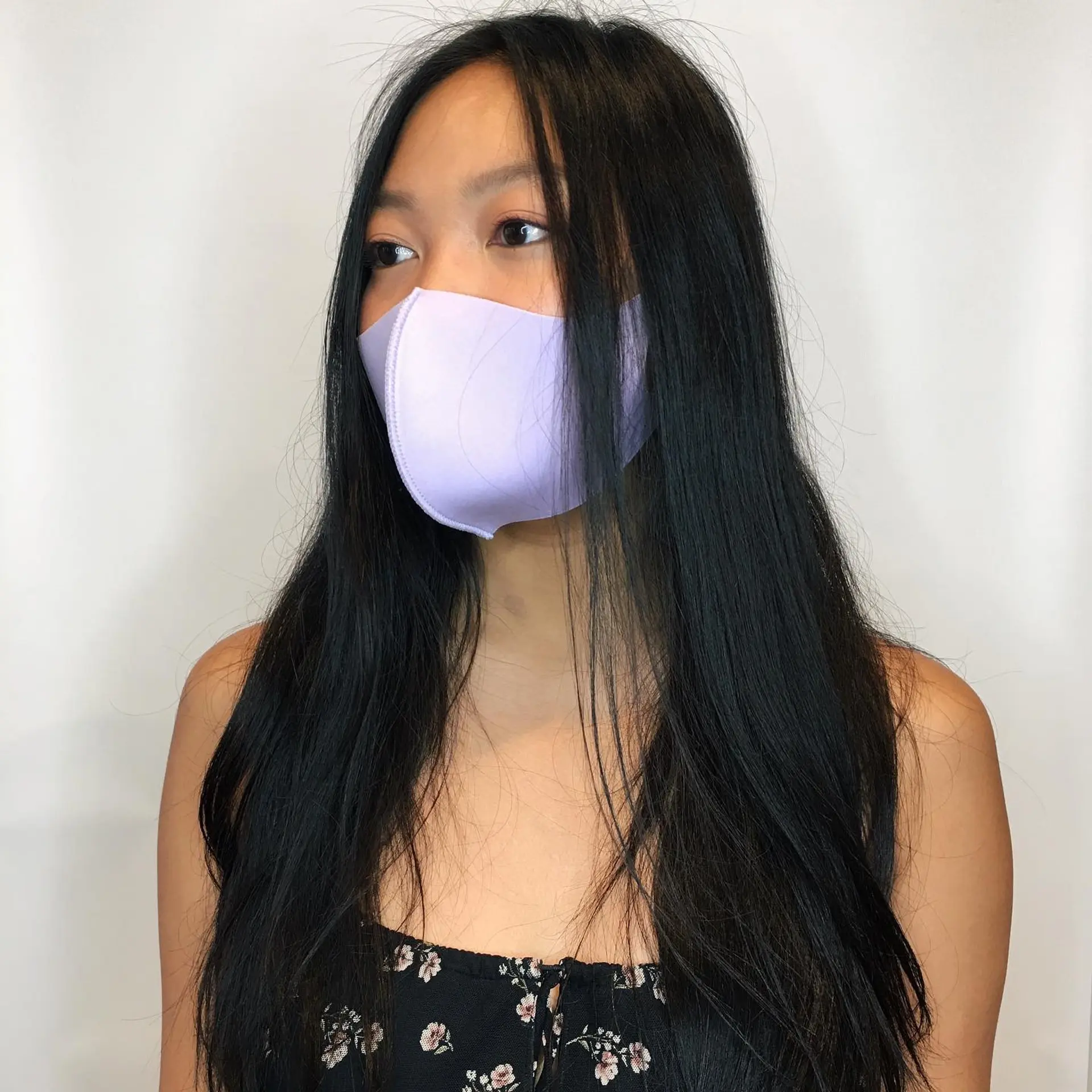 Long, straight black hair styled with subtle face-framing layers and soft natural texture. 1