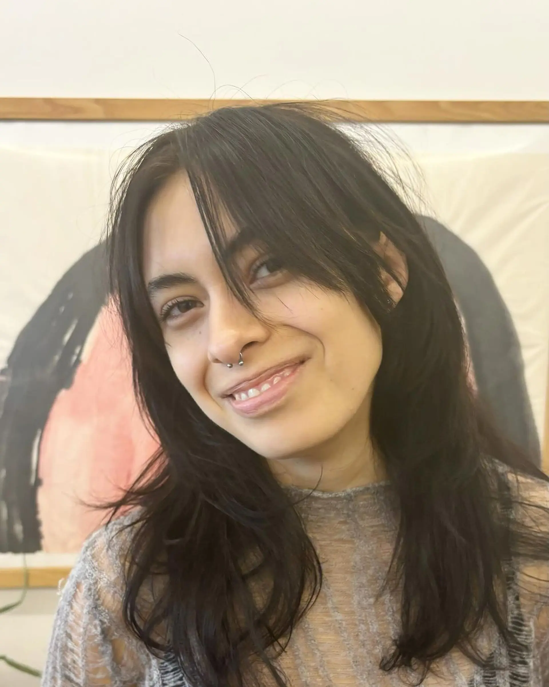 Medium-length, straight black hair with soft layers and a side-swept fringe that frames the face, offering a natural, casual look. Haircut by @takeohair 4