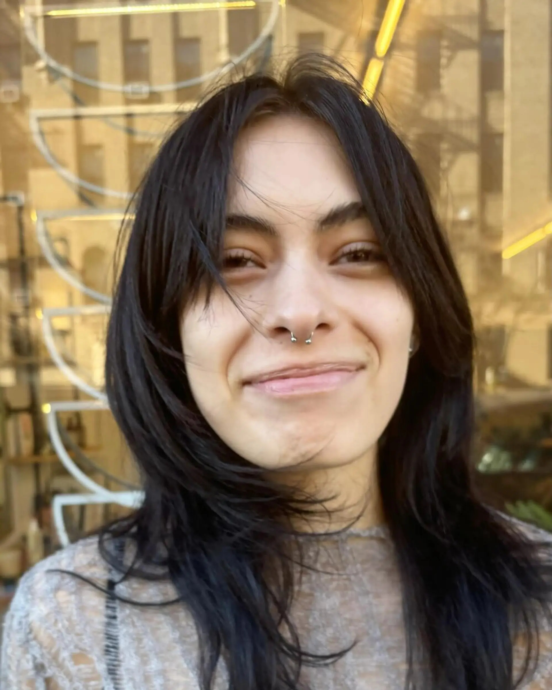 Medium-length, straight black hair with soft layers and a side-swept fringe that frames the face, offering a natural, casual look. Haircut by @takeohair 1