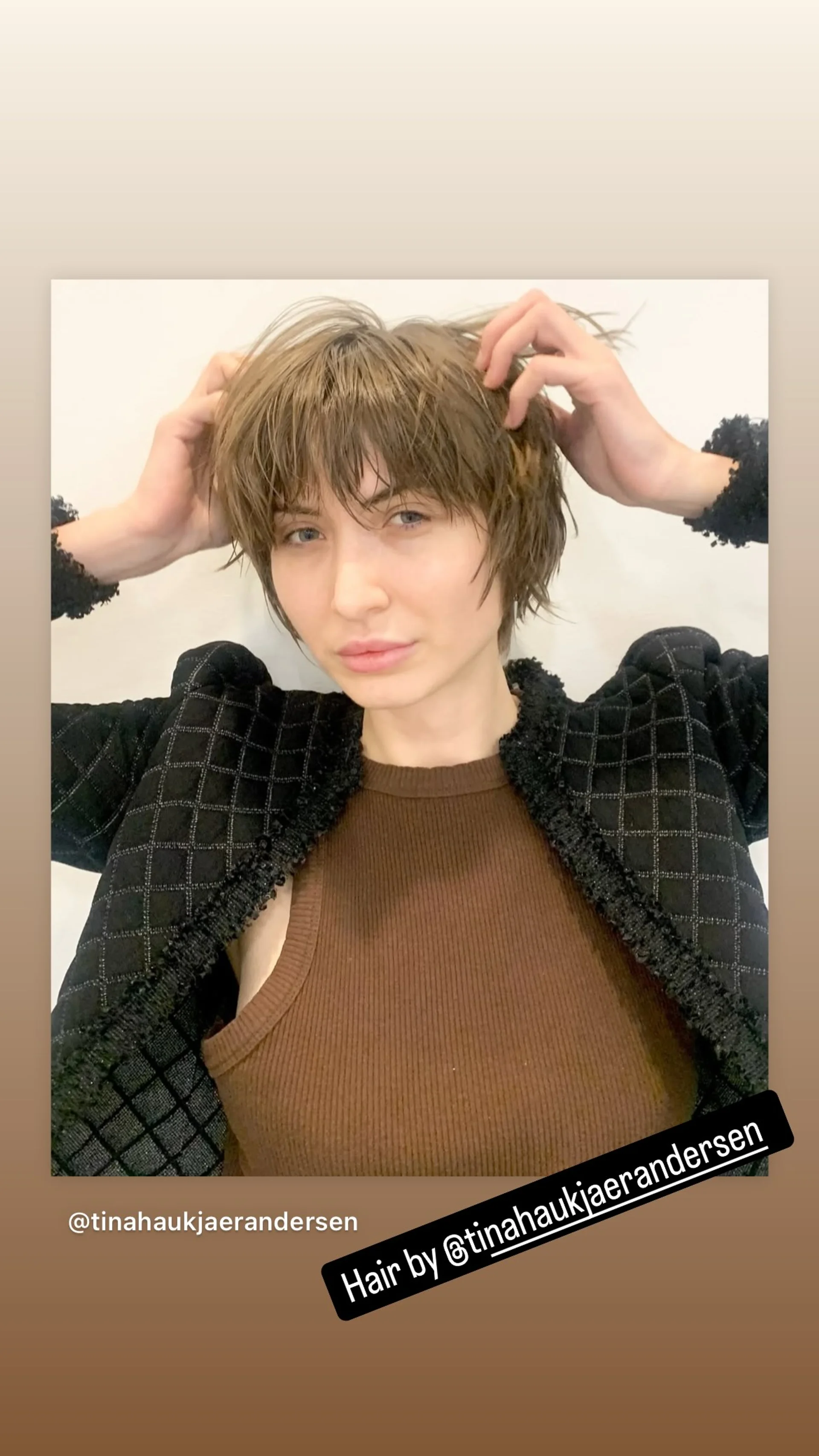 An edgy pixie bob with bangs, styled by shair nyc, perfect for growing out a pixie. - Preview 3