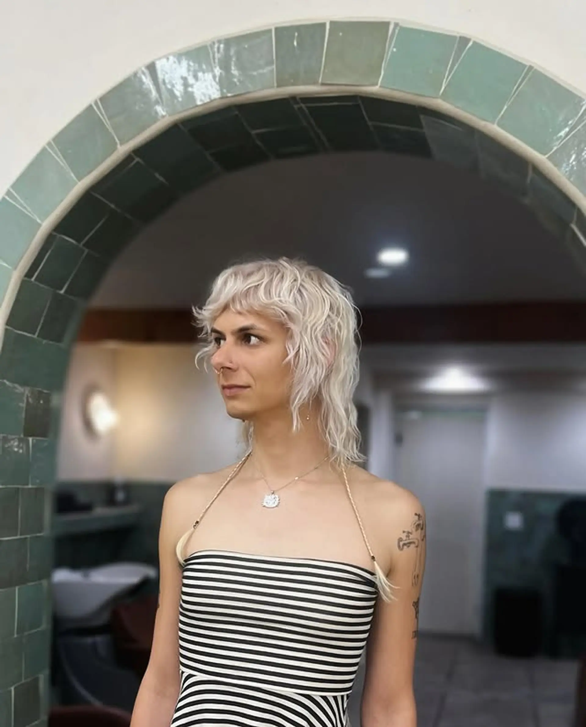 A shaggy, wavy mullet with lots of layers. 1