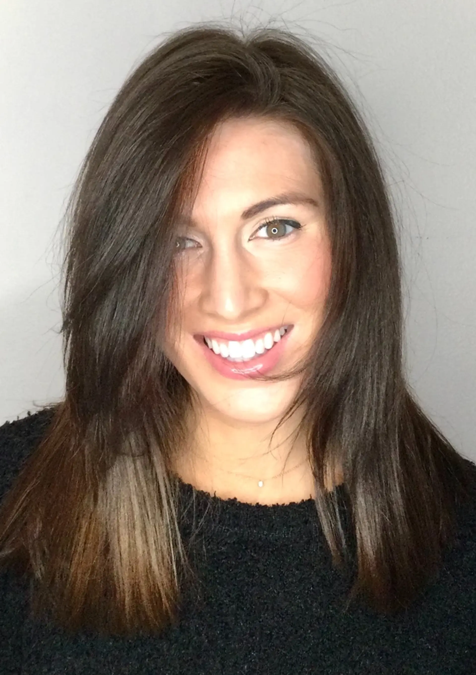 An elegant long straight hairstyle with a side part, enhancing the smooth and silky texture, in a rich dark brown color. 1