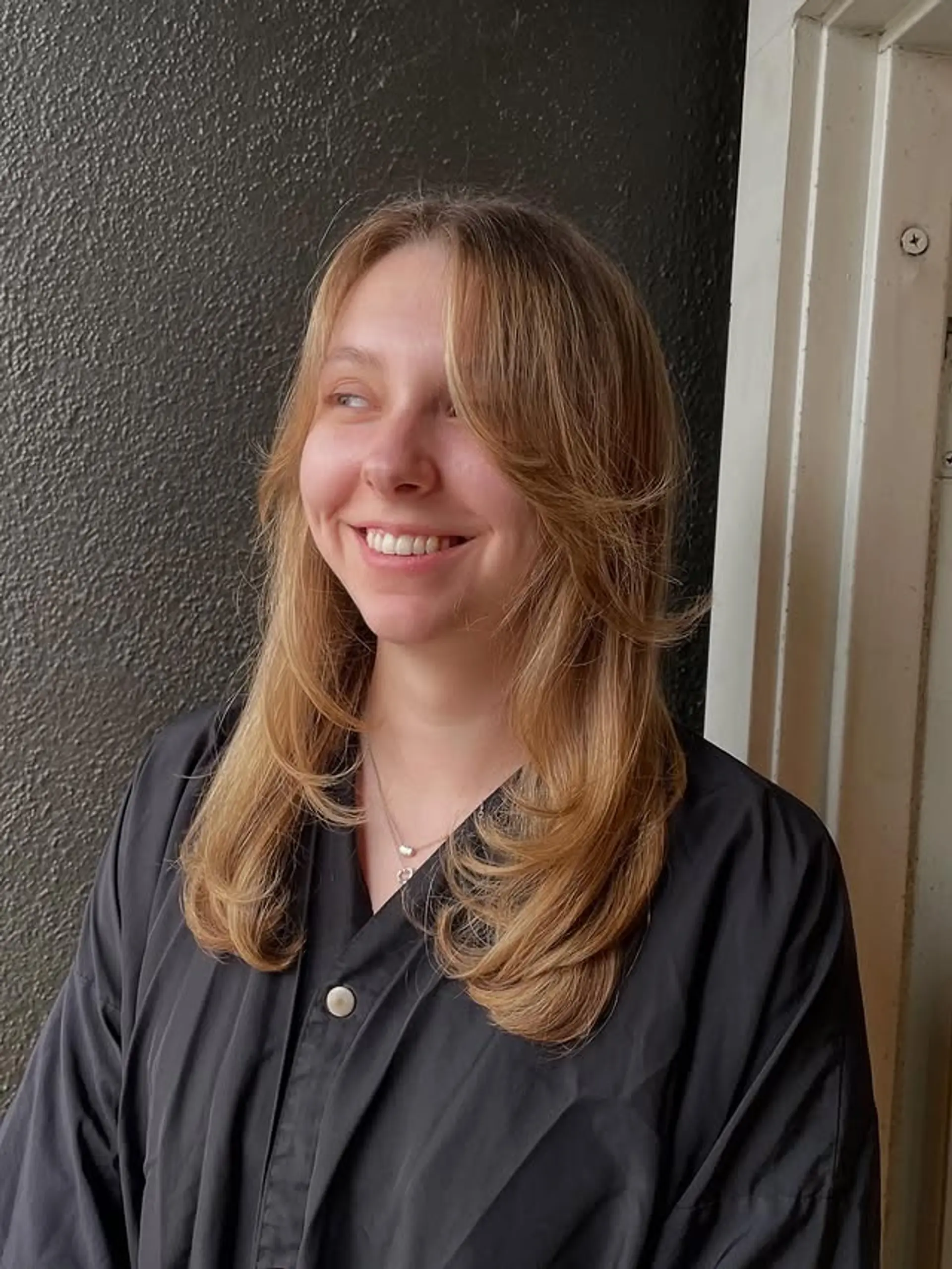 A layered shag with face-framing layers and curtain bangs. 1