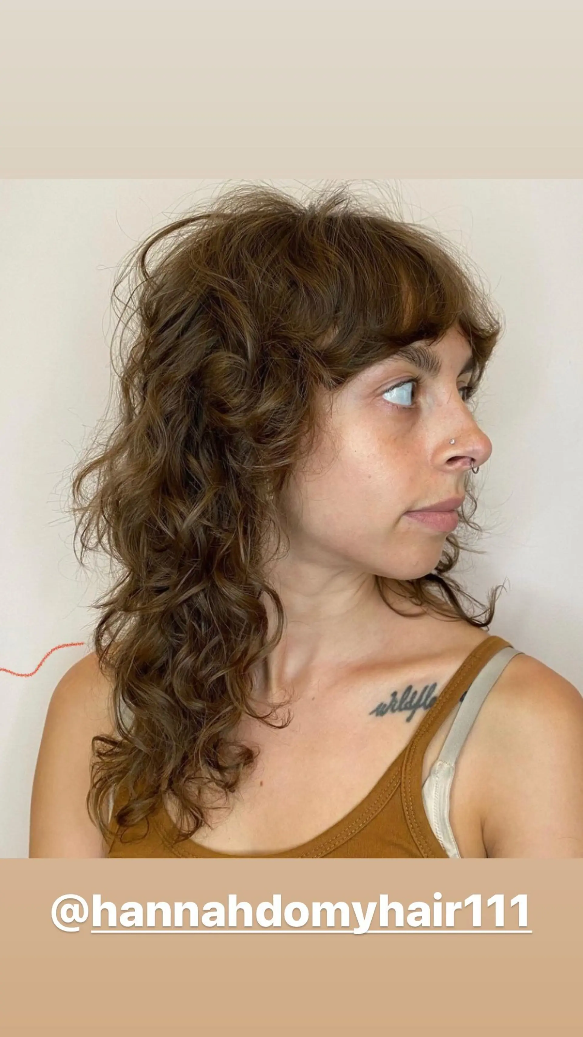 A shaggy mullet with curly texture and bold fringe. 1