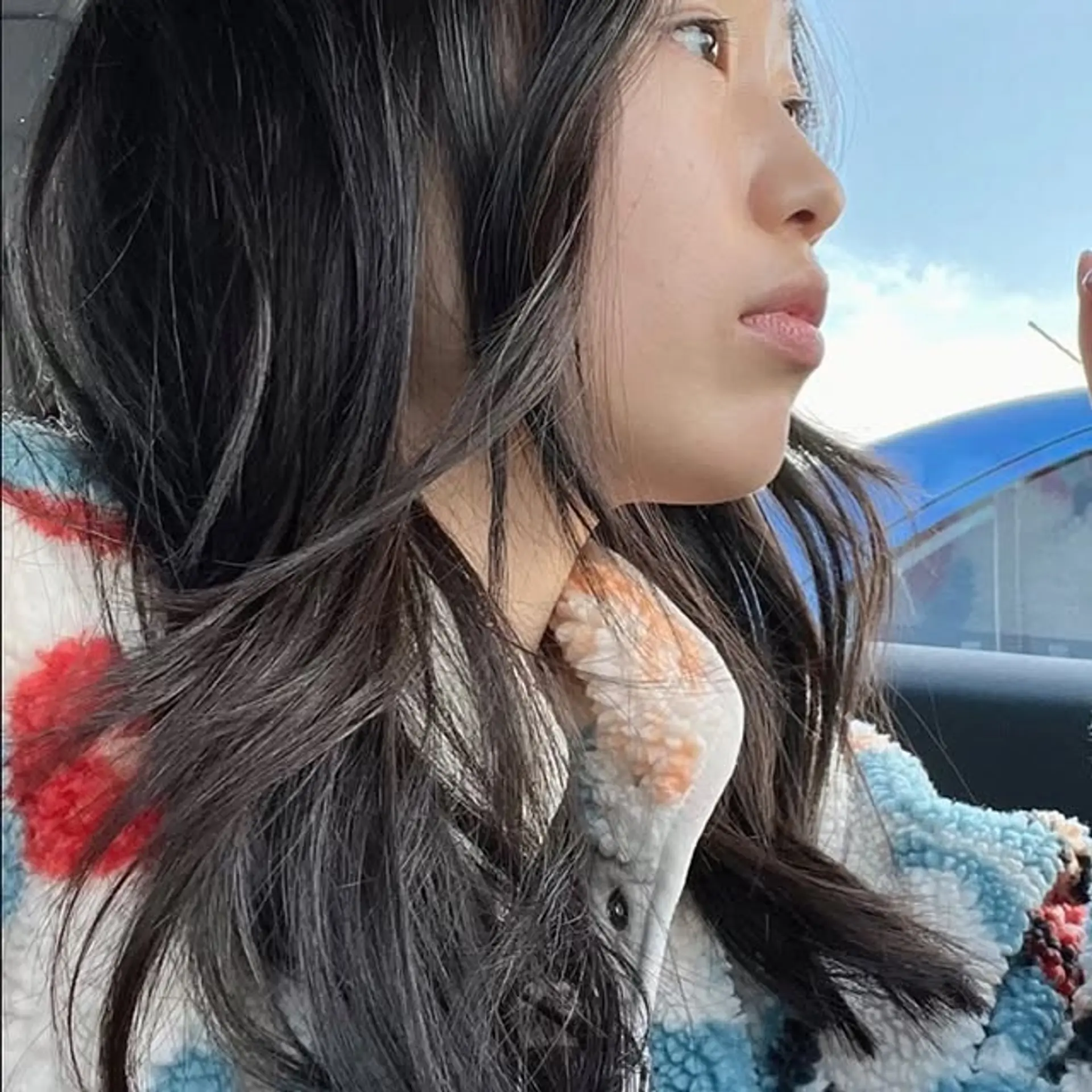 Long layered hairstyle with soft waves. 1