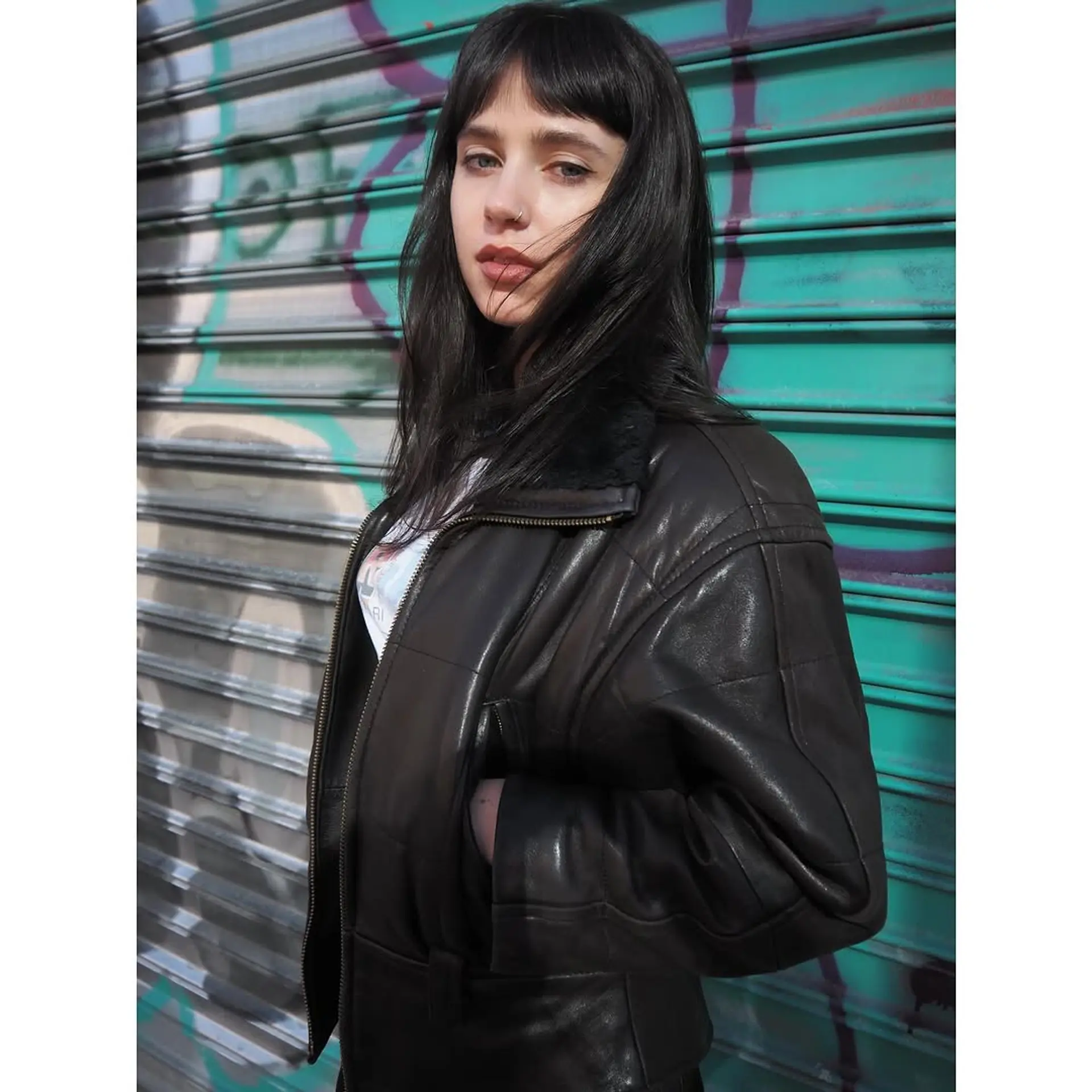 Long, straight hair with blunt bangs. 1