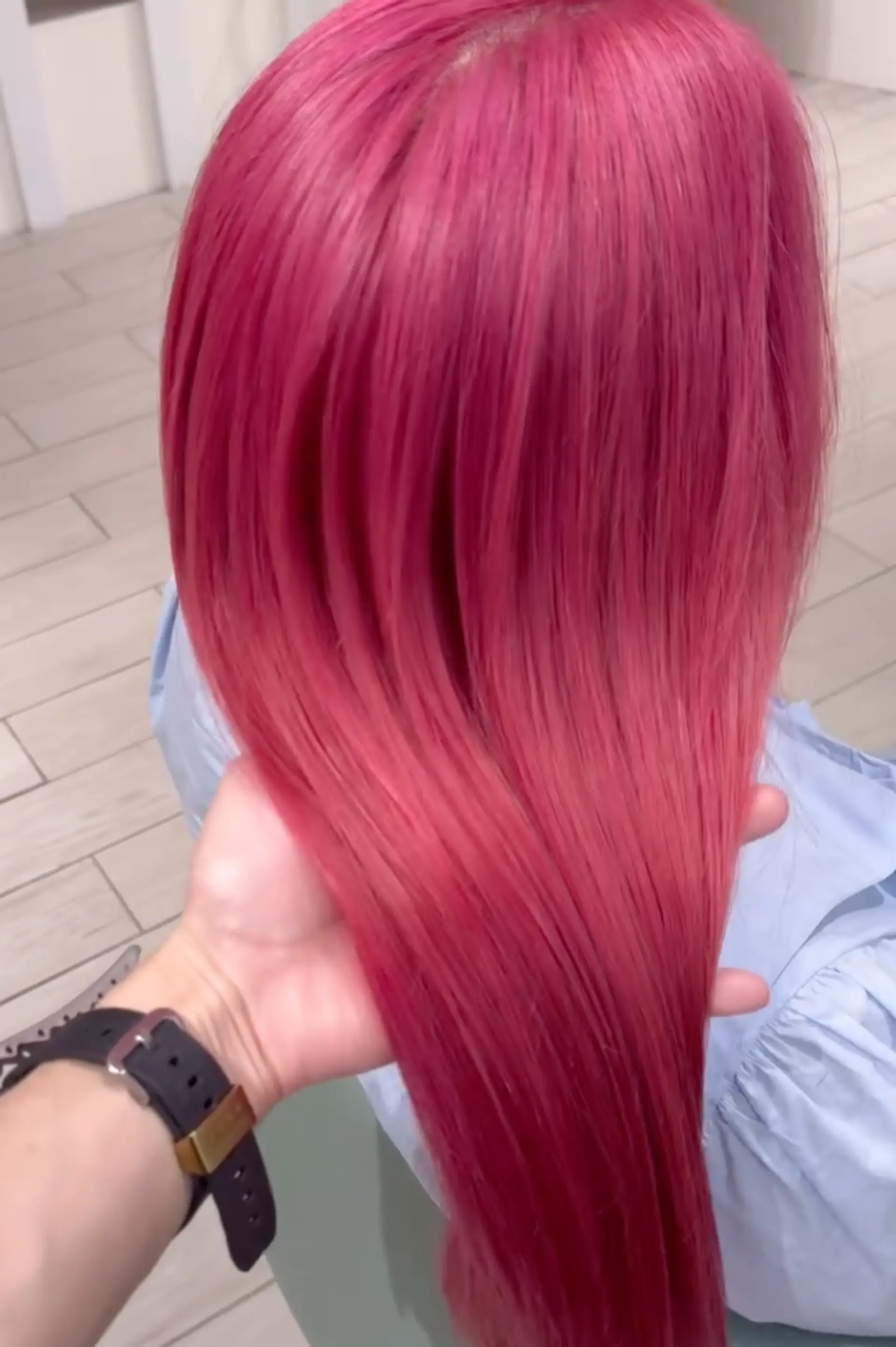 Long, straight hair with a vibrant pink-reddish gradient, featuring neat layers and a smooth finish.

Stylist: @masaki.newyork 1