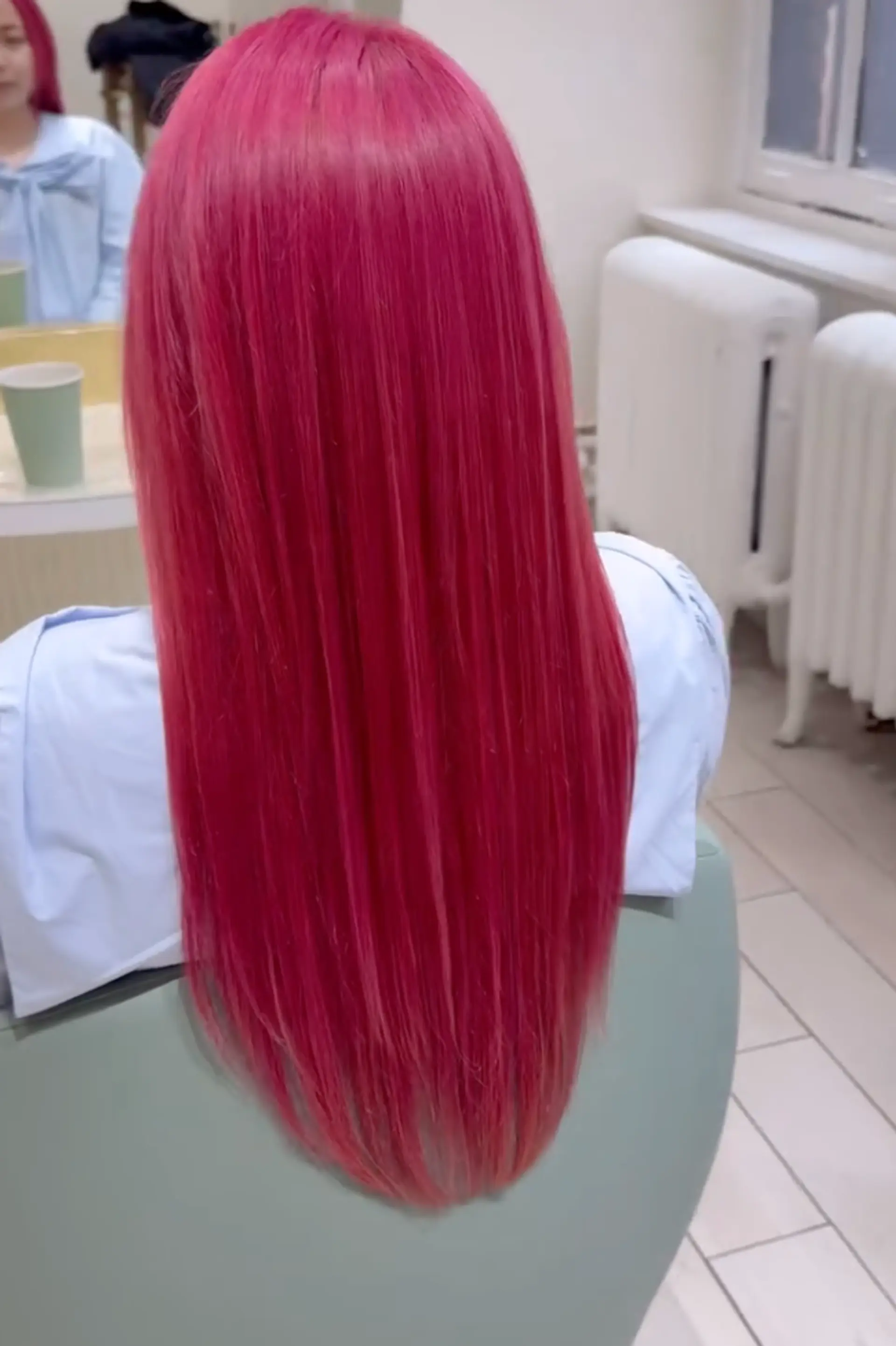 Long, straight hair with a vibrant pink-reddish gradient, featuring neat layers and a smooth finish.

Stylist: @masaki.newyork 2