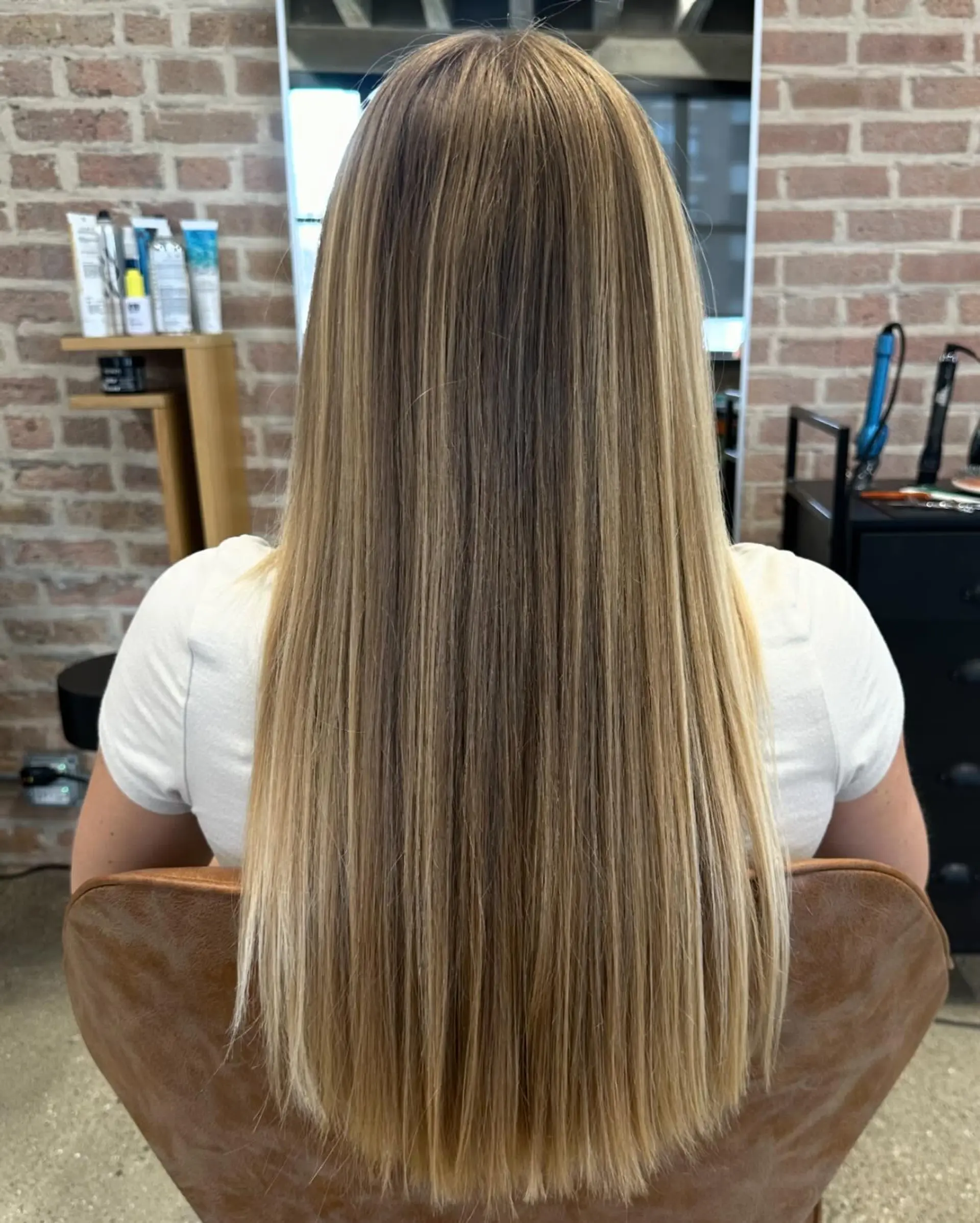 Beachy waves with soft, face-framing curtain bangs. 2