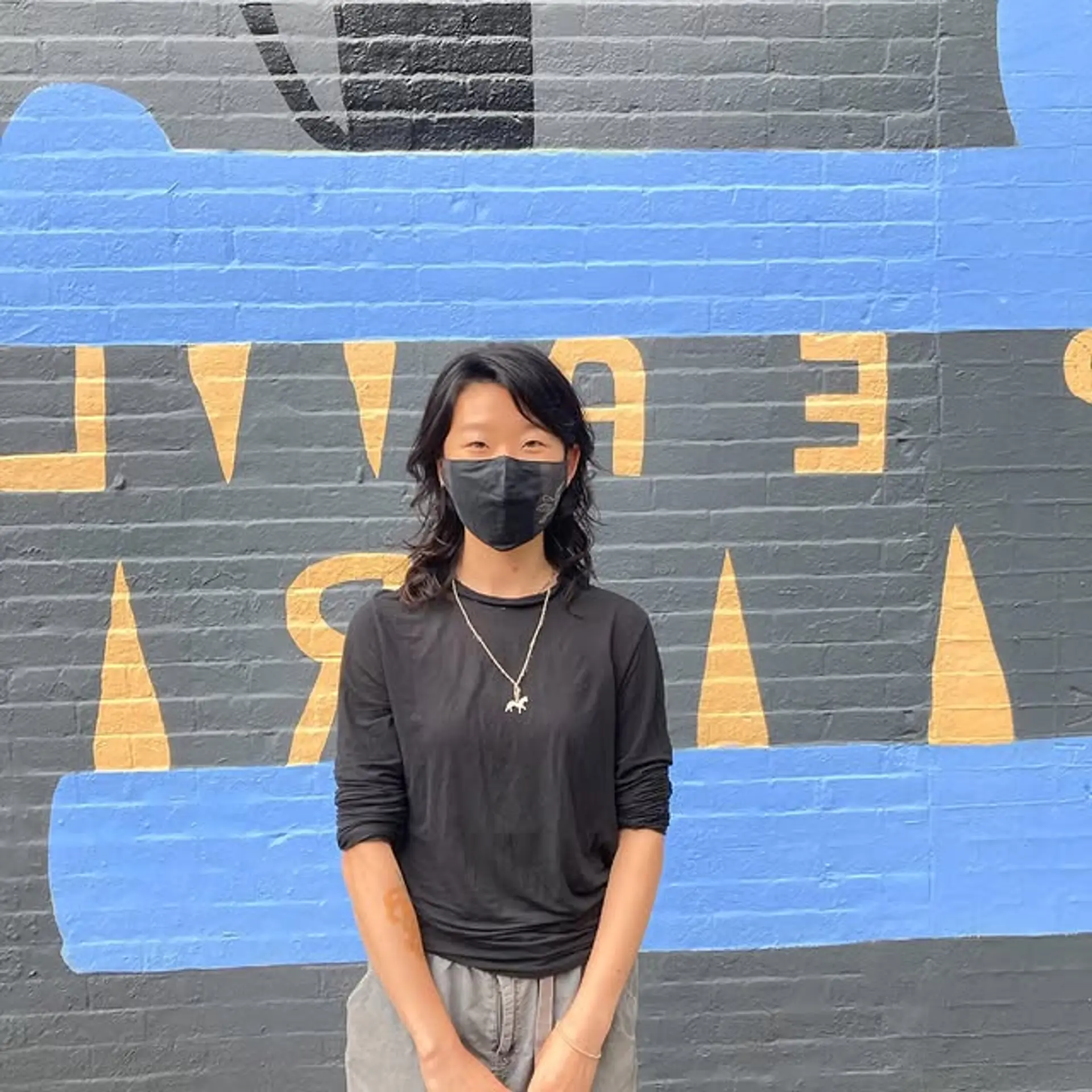 A medium-length haircut with soft waves and subtle layering for added movement. 1