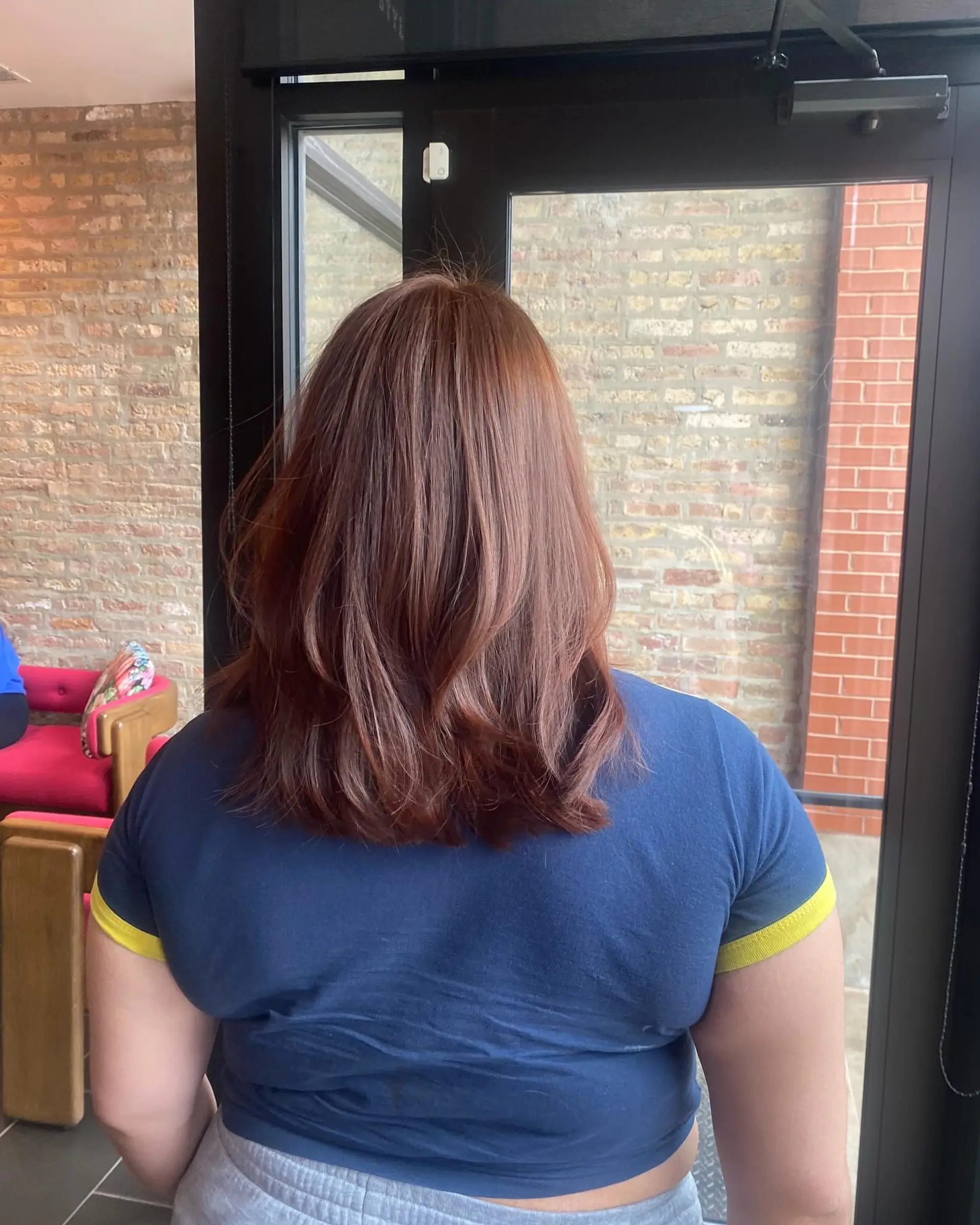 A layered bob with trendy curtain bangs and face-framing layers. 3