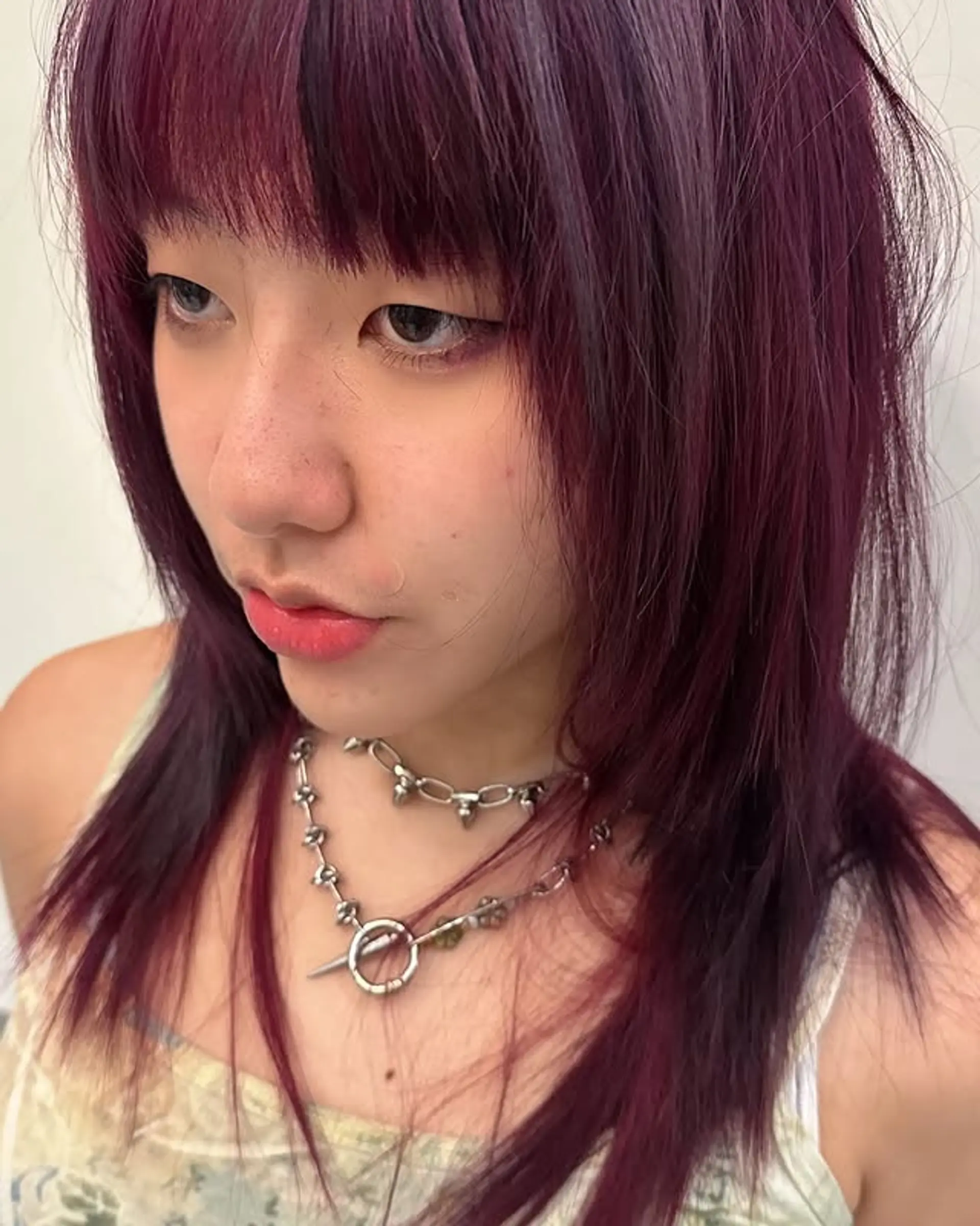 A modern shag haircut with layers and fringe bangs. 1