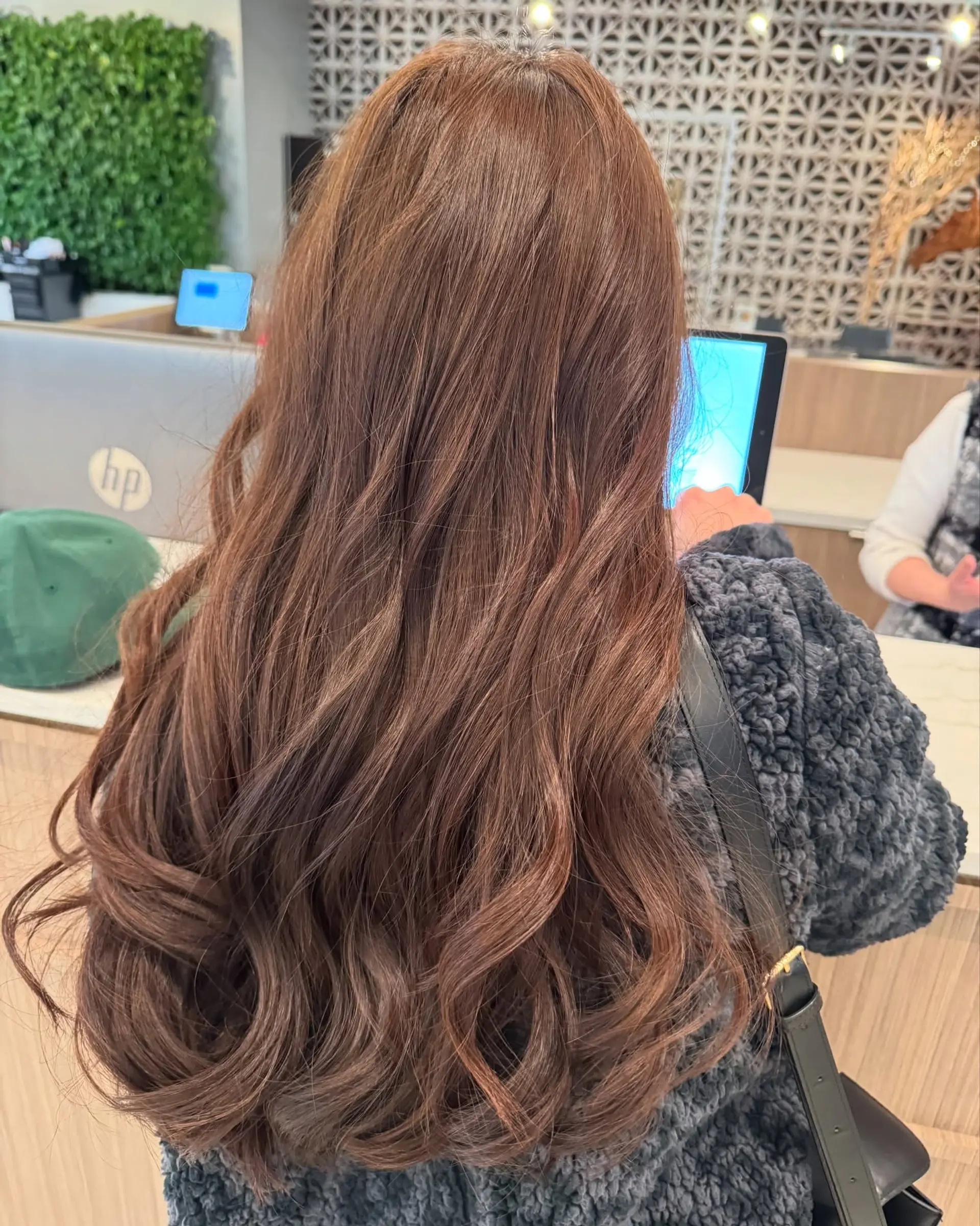 A long wavy hairstyle with a romantic, feminine feel. 1