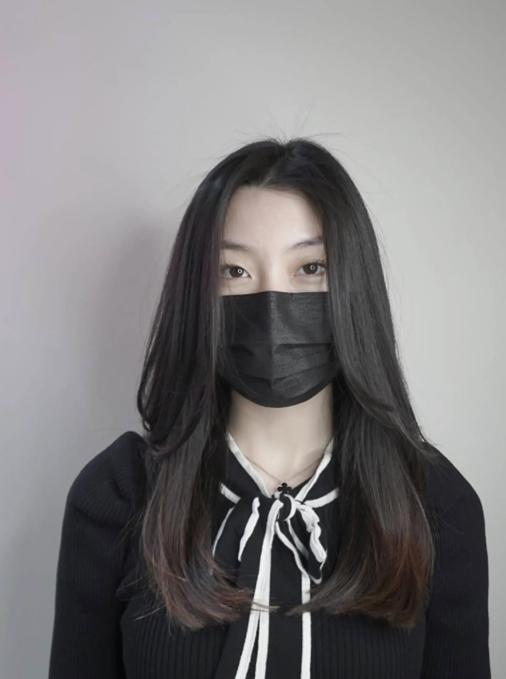 Long, layered haircut with face-framing layers. 1