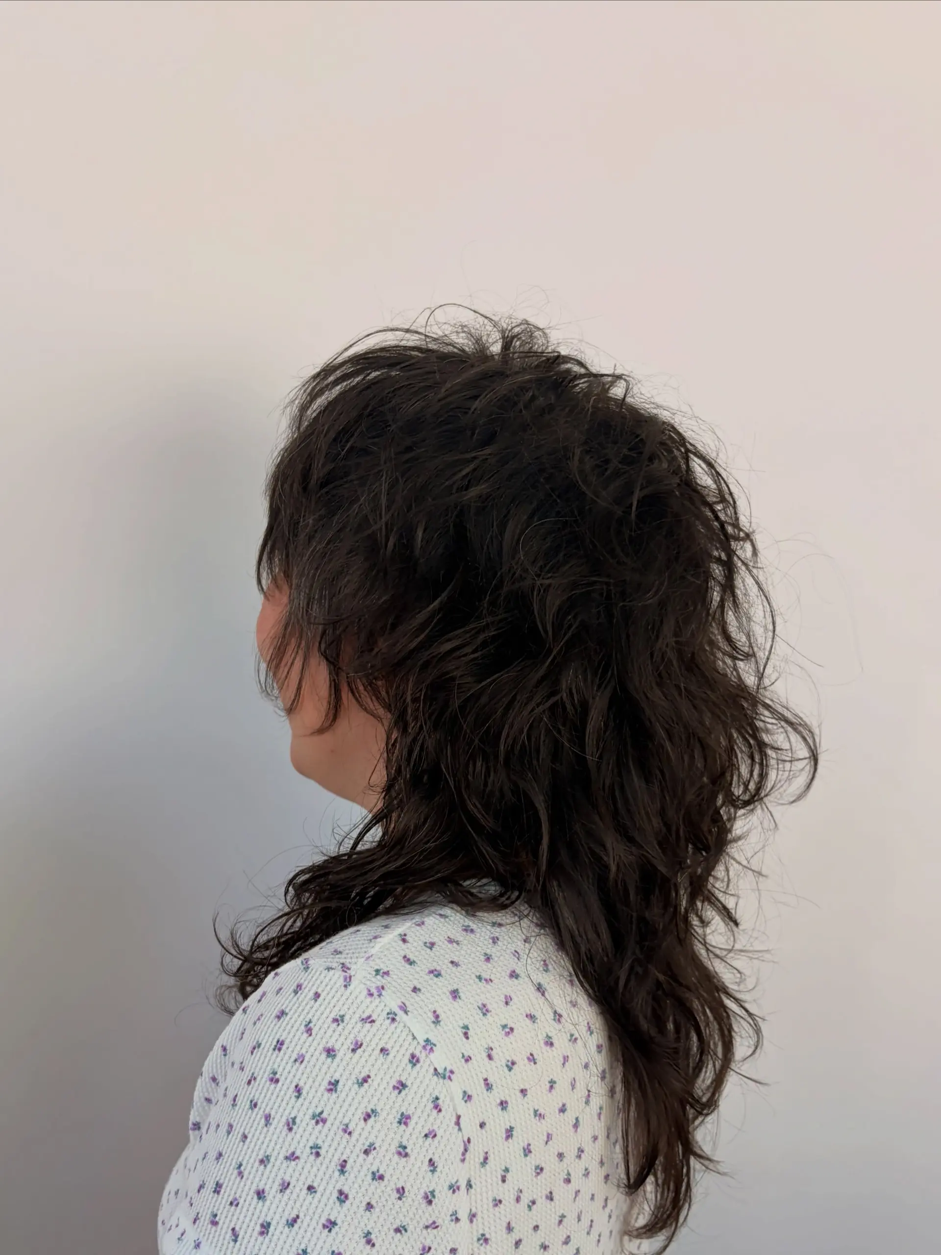 A medium-length textured shag with tousled layers and soft waves. 1