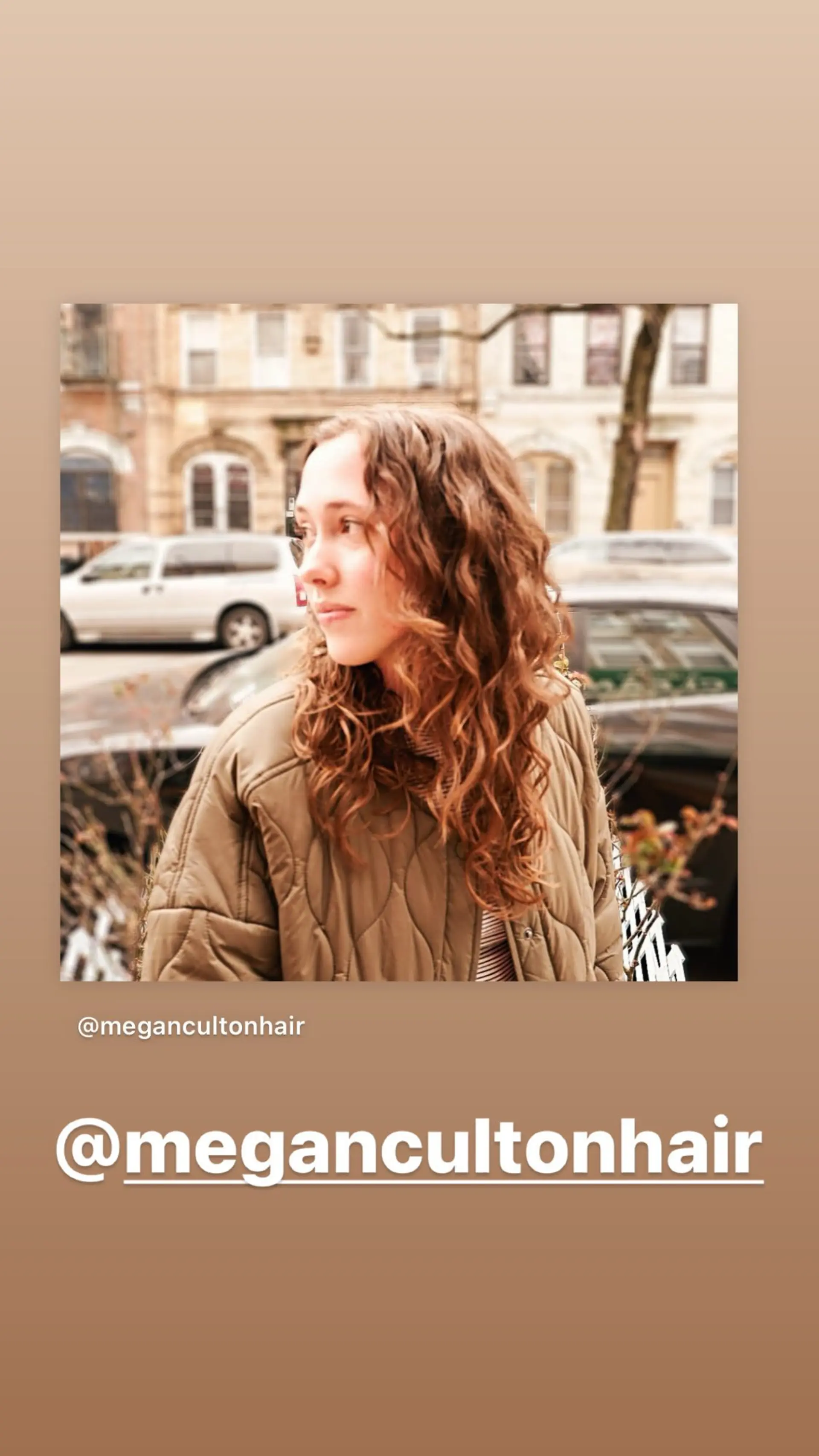 A medium-length hairstyle featuring loose, natural-looking copper curls. 1