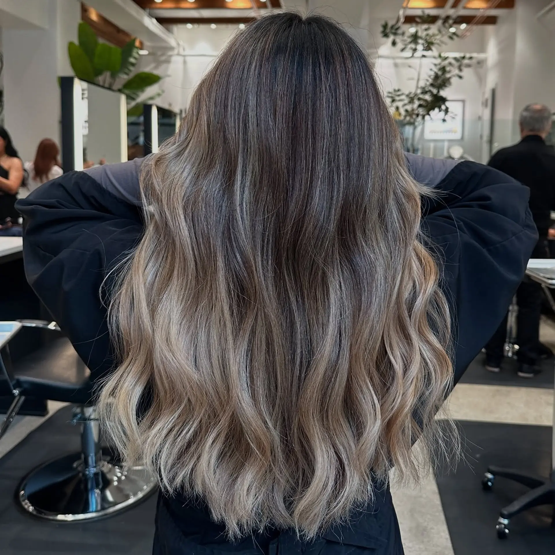 Long, wavy hair with a caramel blonde balayage. 1