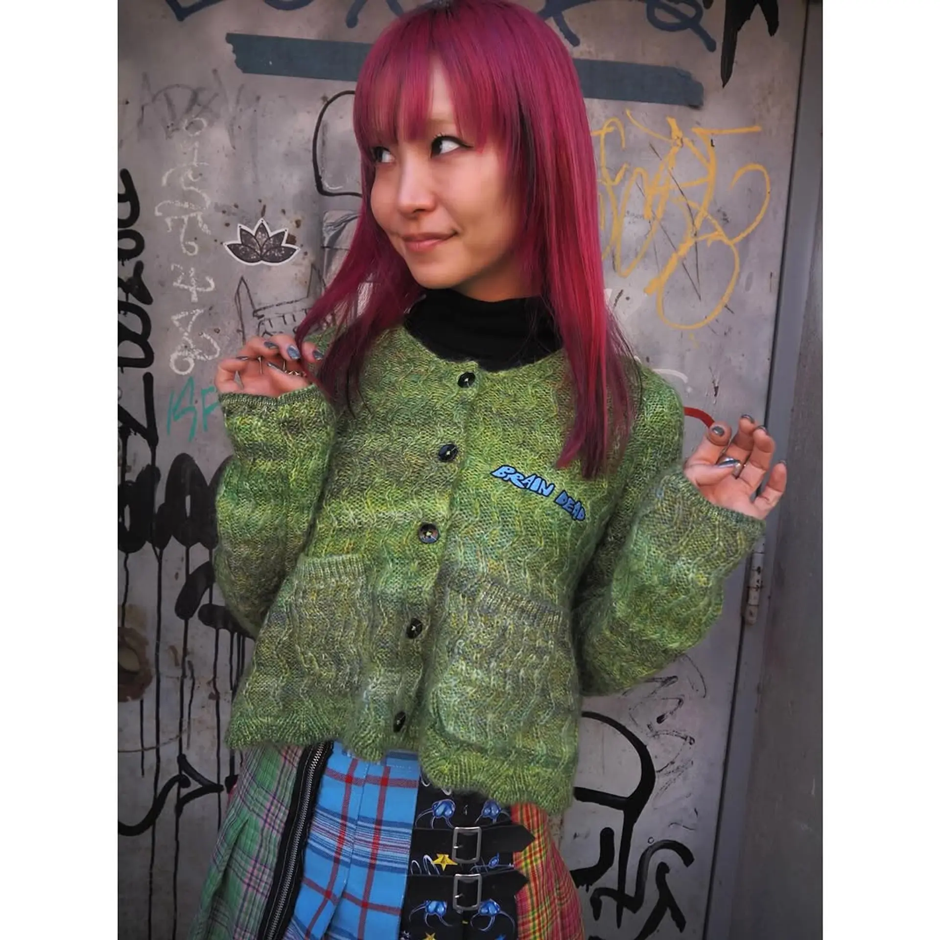 A trendy medium-length shag haircut with bangs. 1