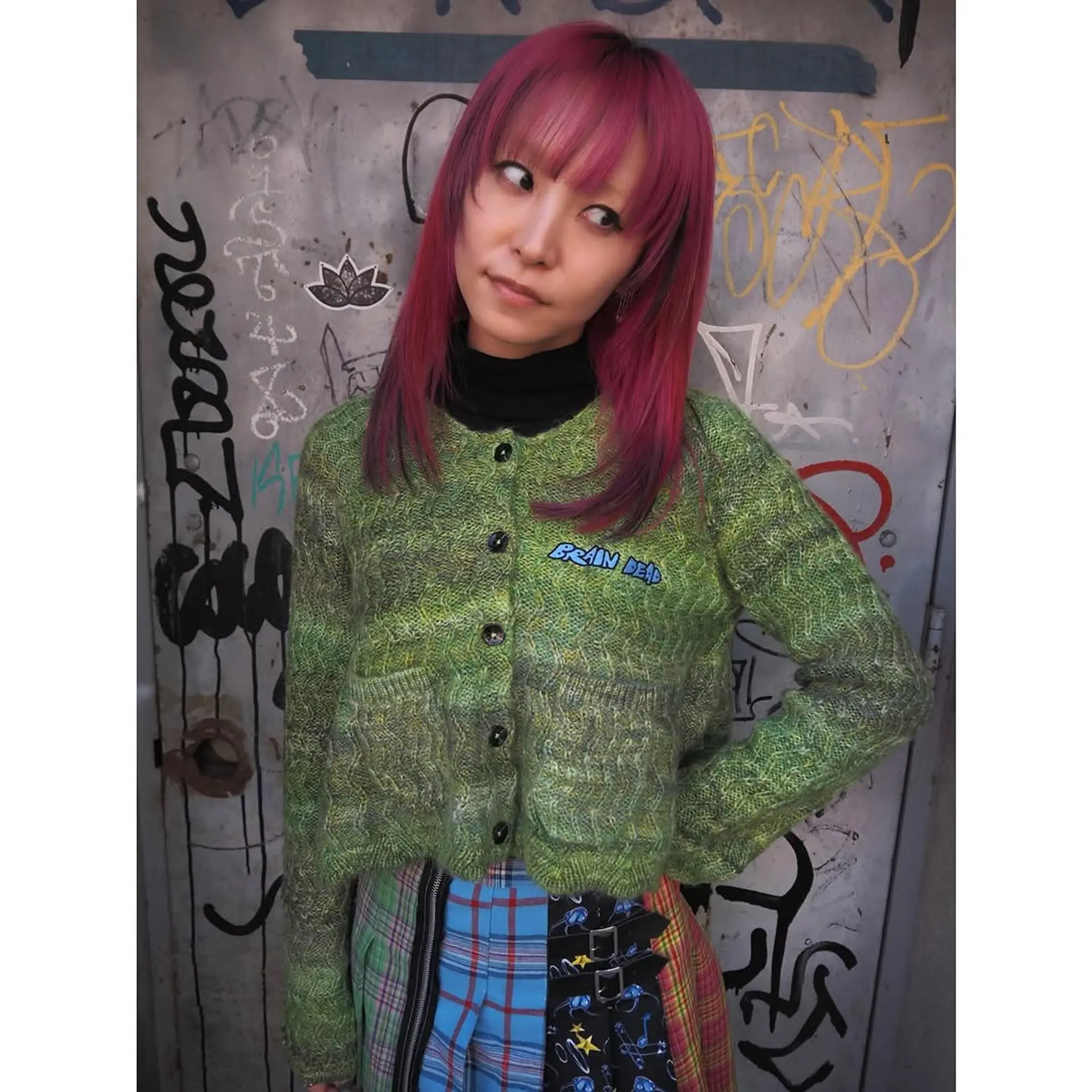 A trendy medium-length shag haircut with bangs. 2