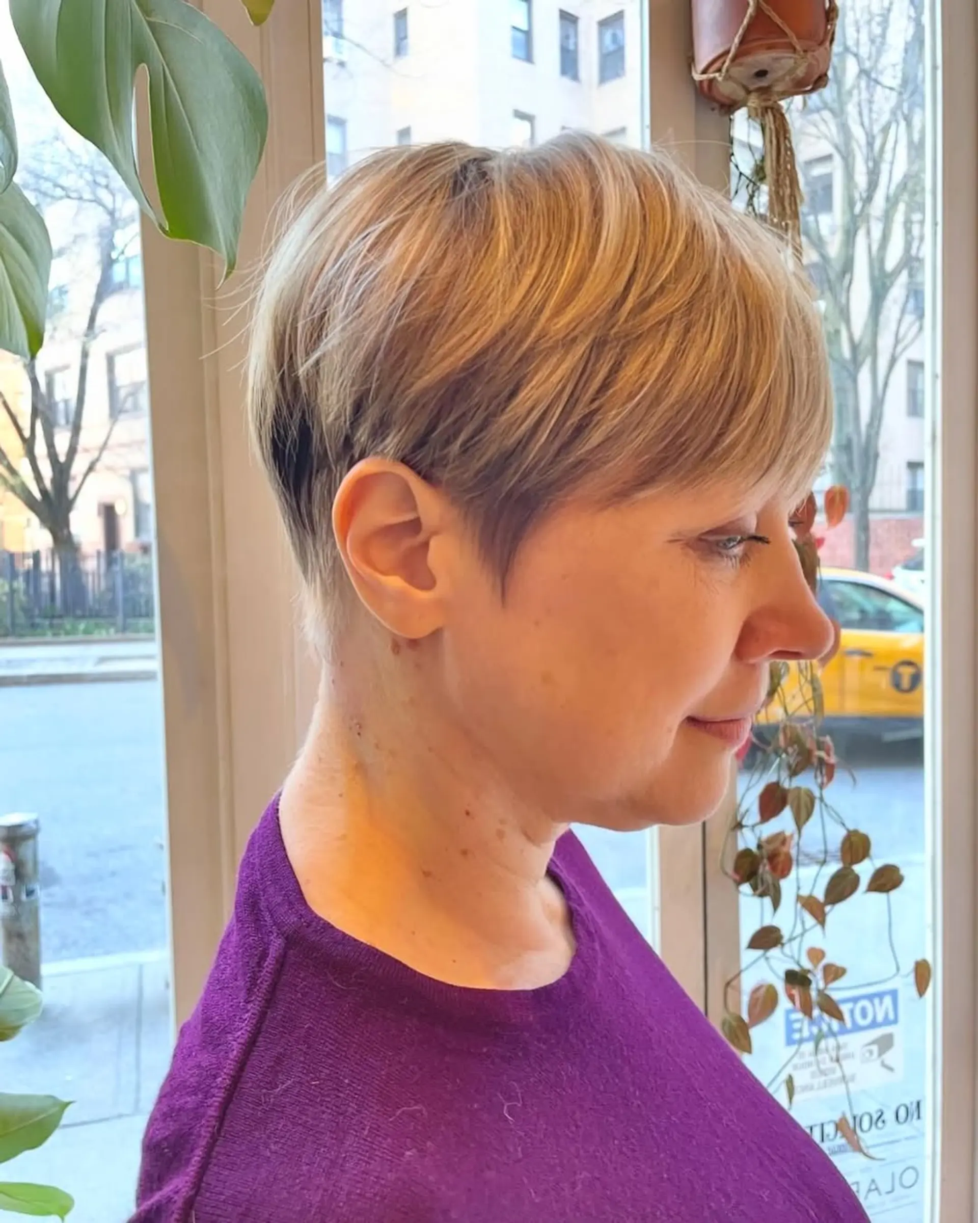 A short pixie cut with textured bangs. 2