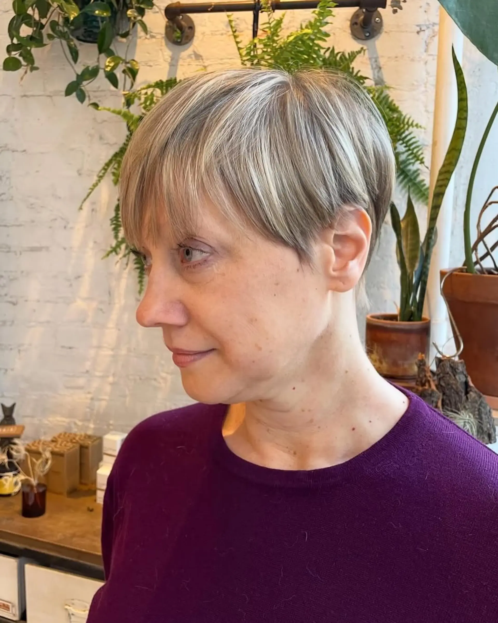 A short pixie cut with textured bangs. 3