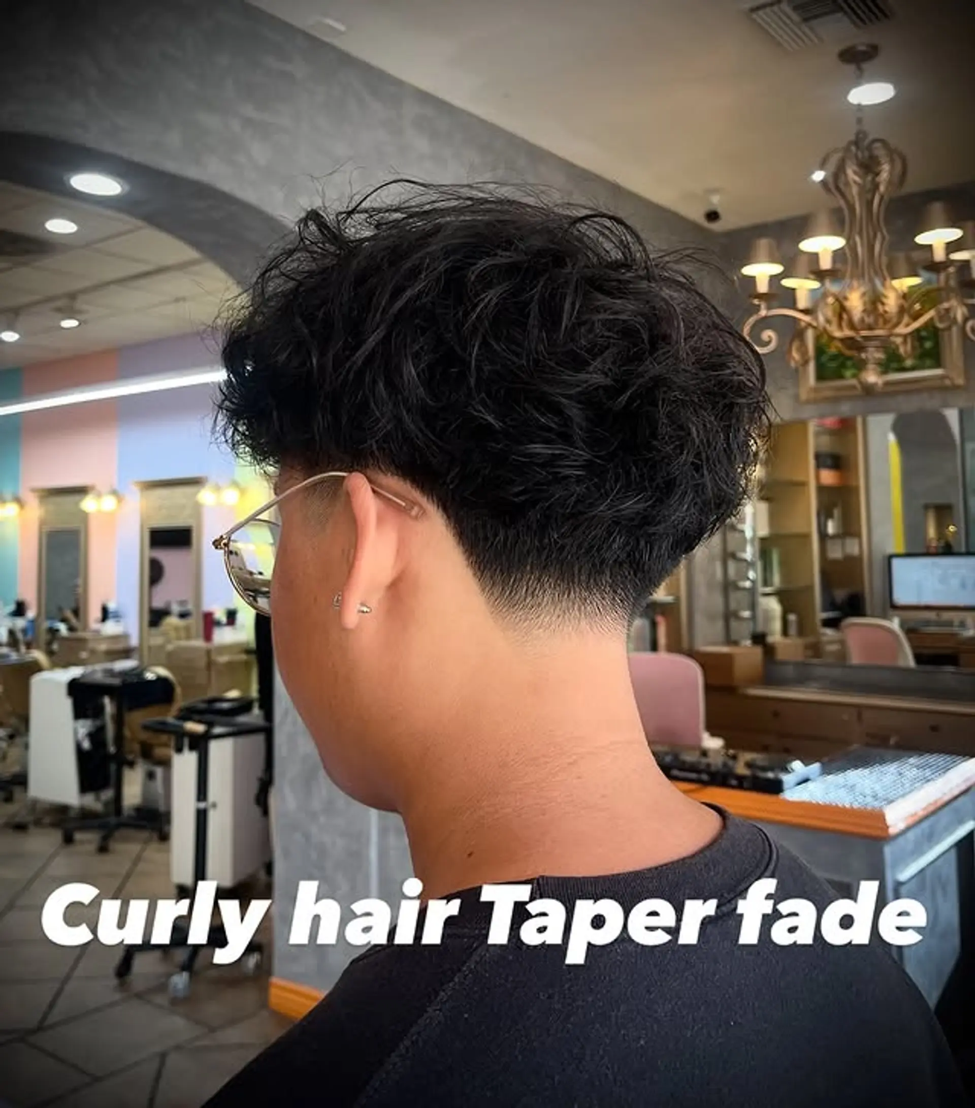 A short, textured crop with a clean taper fade. 1