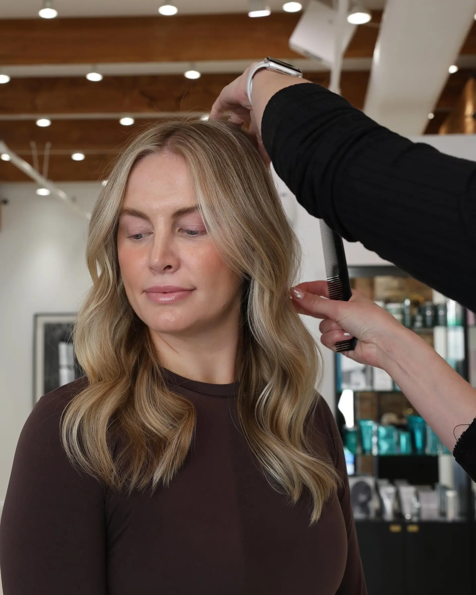 Medium length wavy hair with blonde balayage. 6