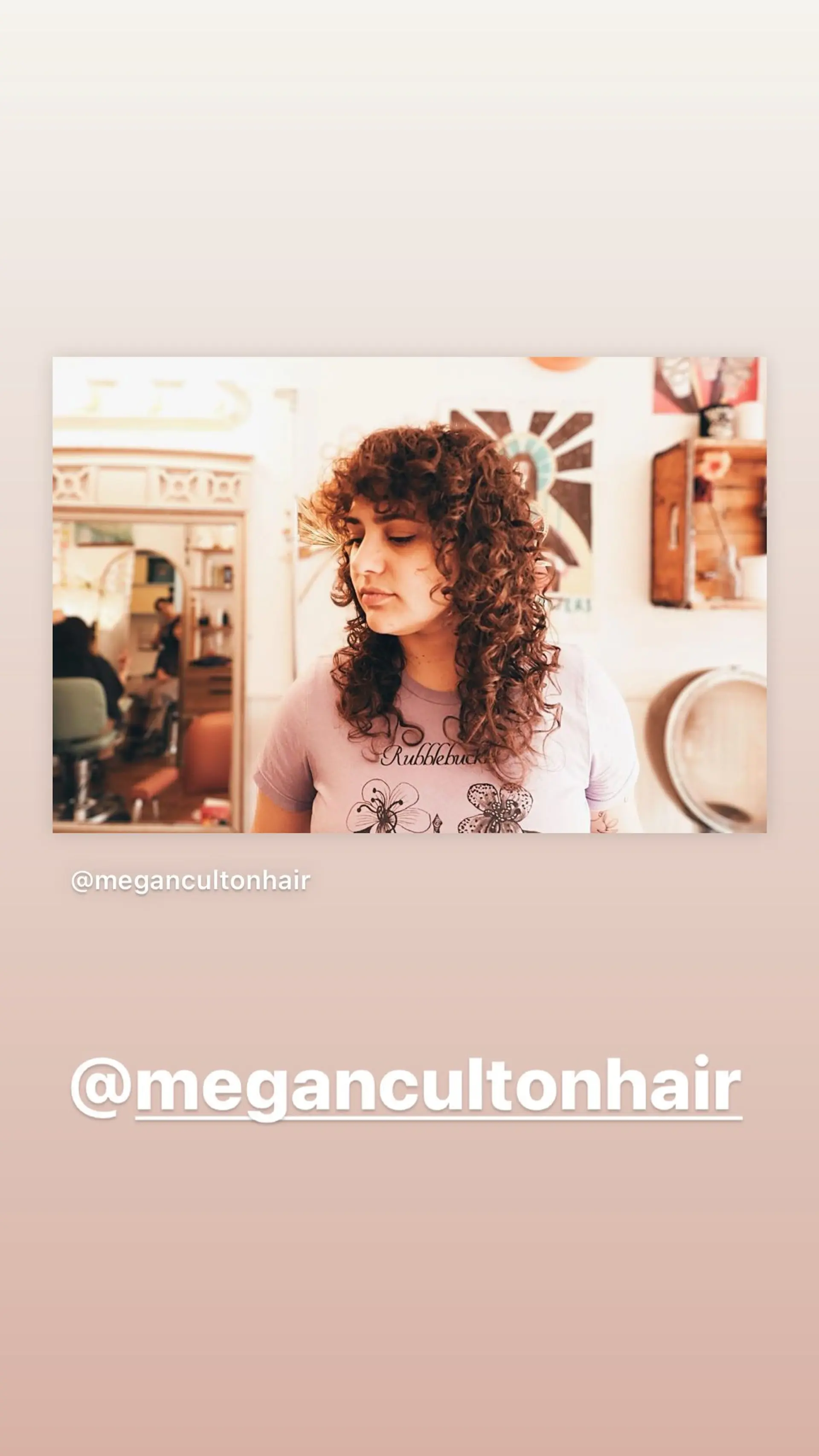 A layered, curly shag haircut with fringe bangs. 1