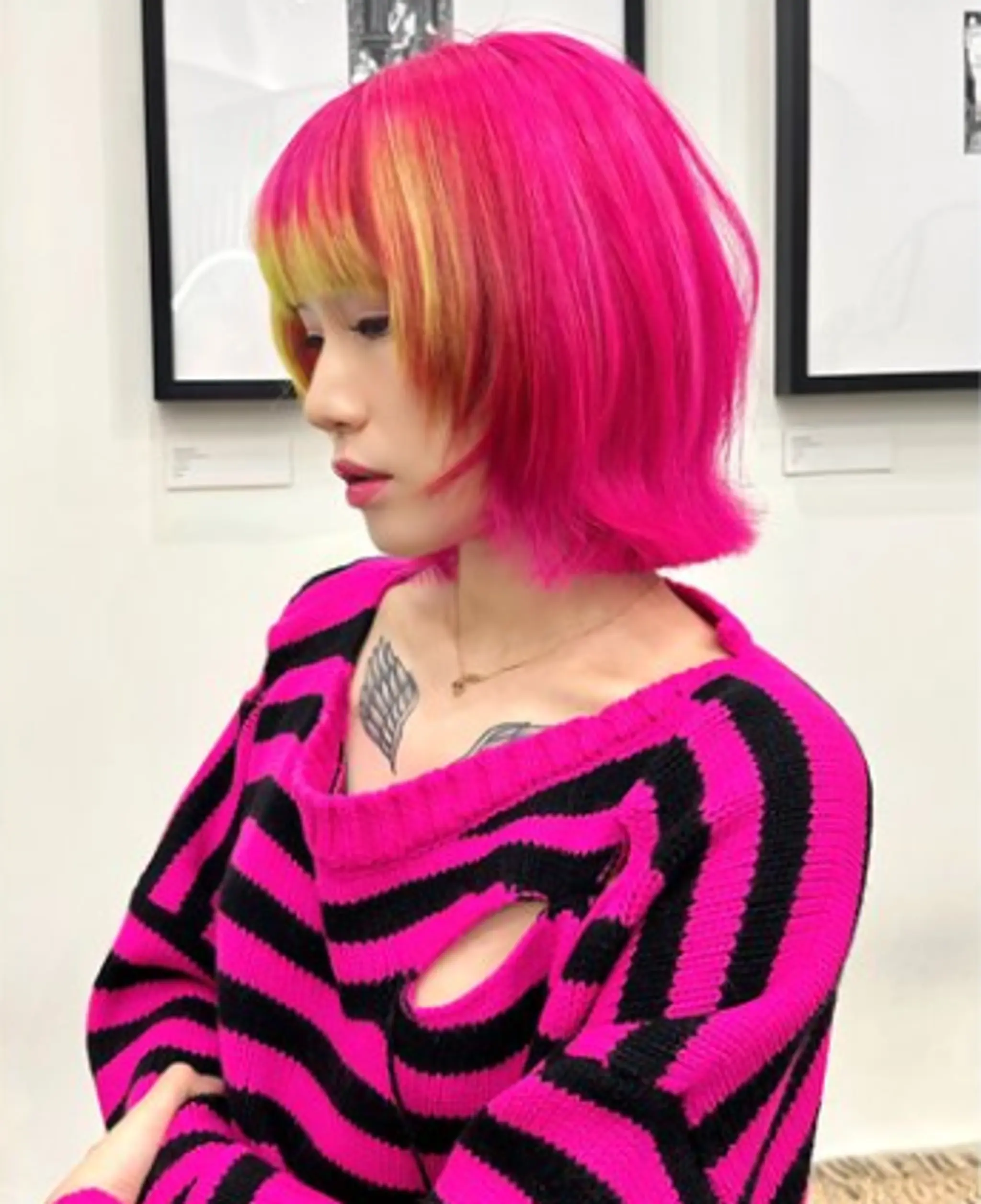 Short, straight bob cut in neon pink with blunt bangs and vibrant yellow highlights, featuring layers and textured ends.

(NonstopStyle: by Vincent) 1