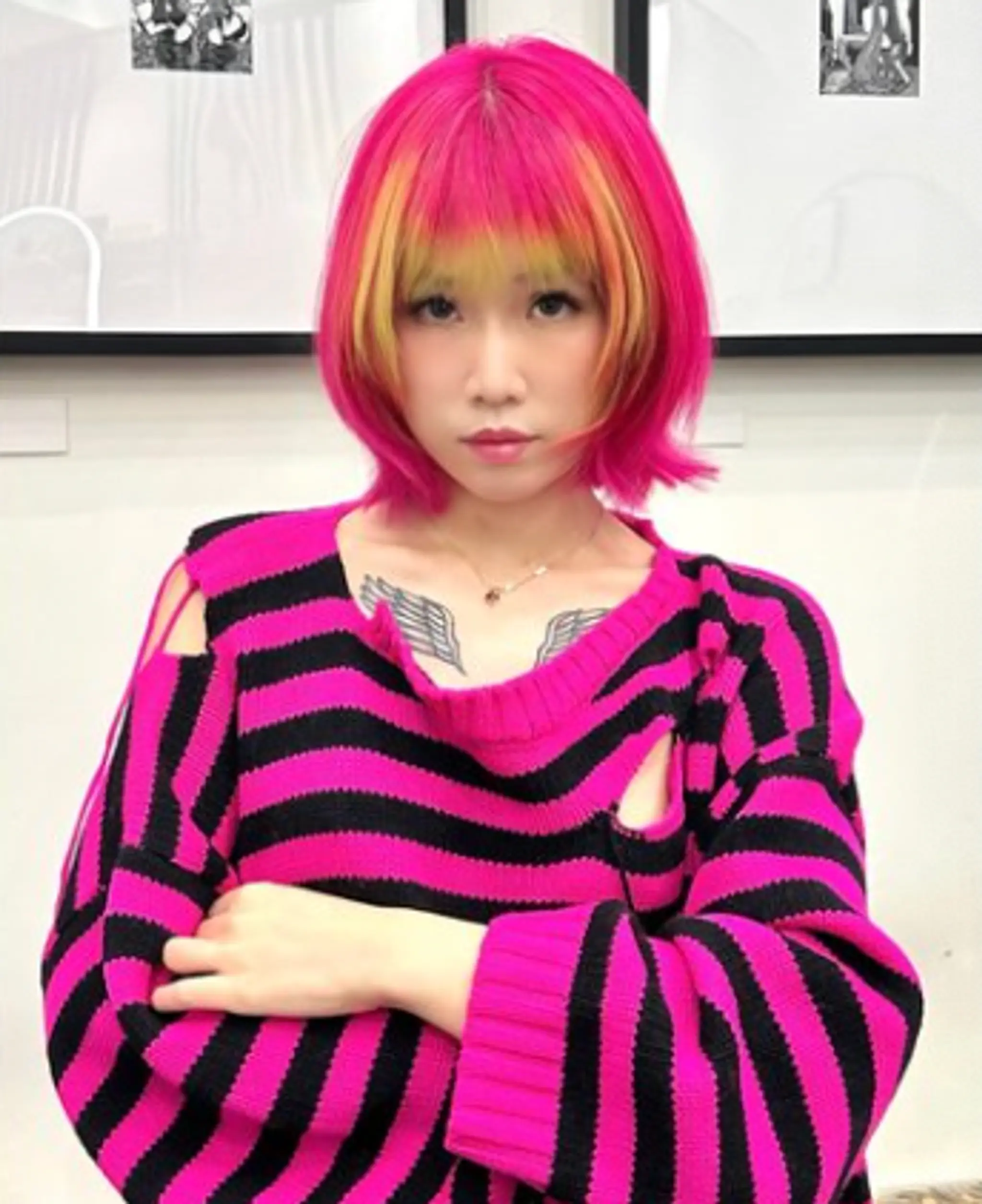 Short, straight bob cut in neon pink with blunt bangs and vibrant yellow highlights, featuring layers and textured ends.

(NonstopStyle: by Vincent) 2