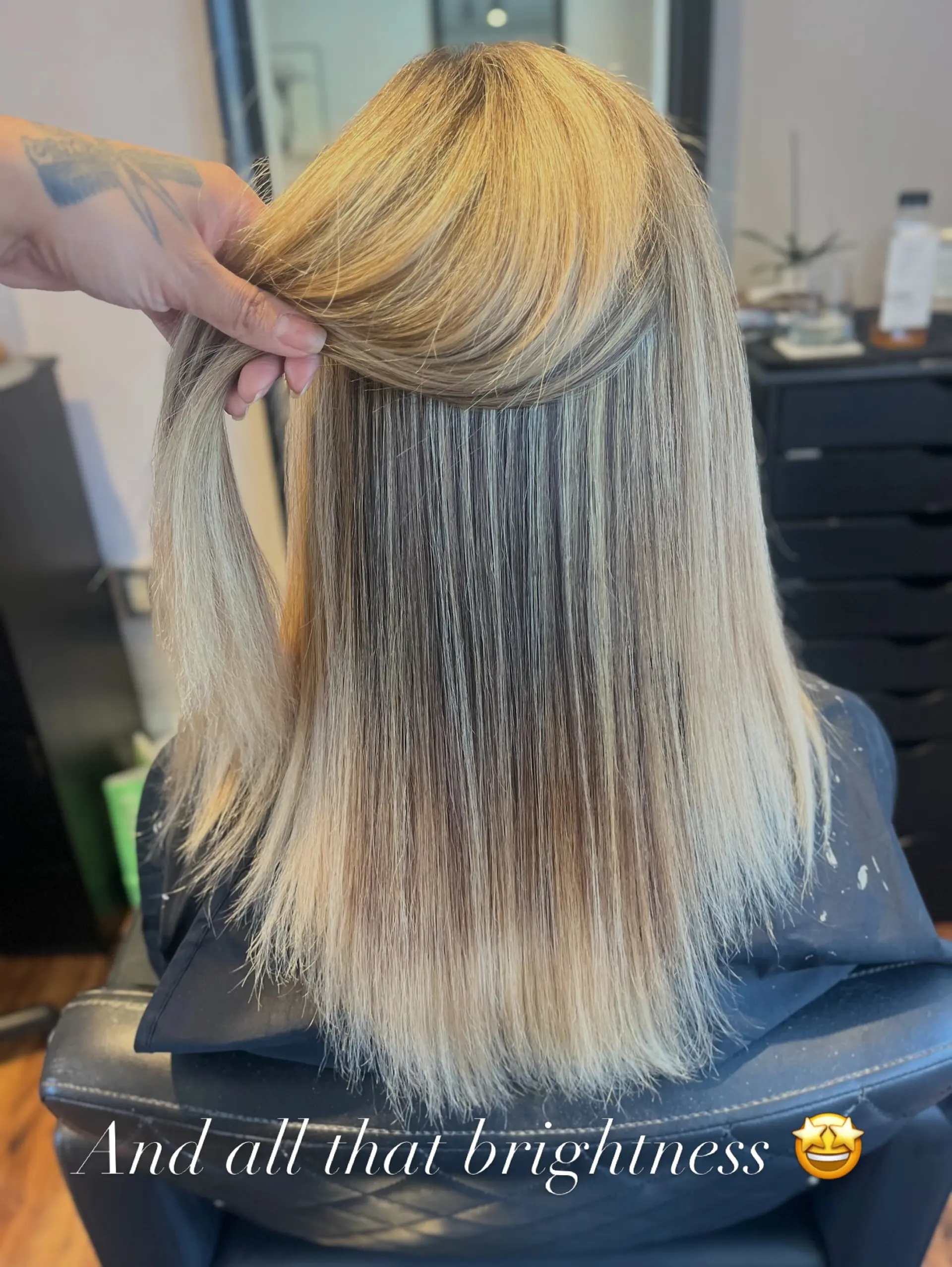 Straight medium-length blonde hair featuring dimensional highlights and lowlights, lifted to reveal smooth depth and brightness. 1