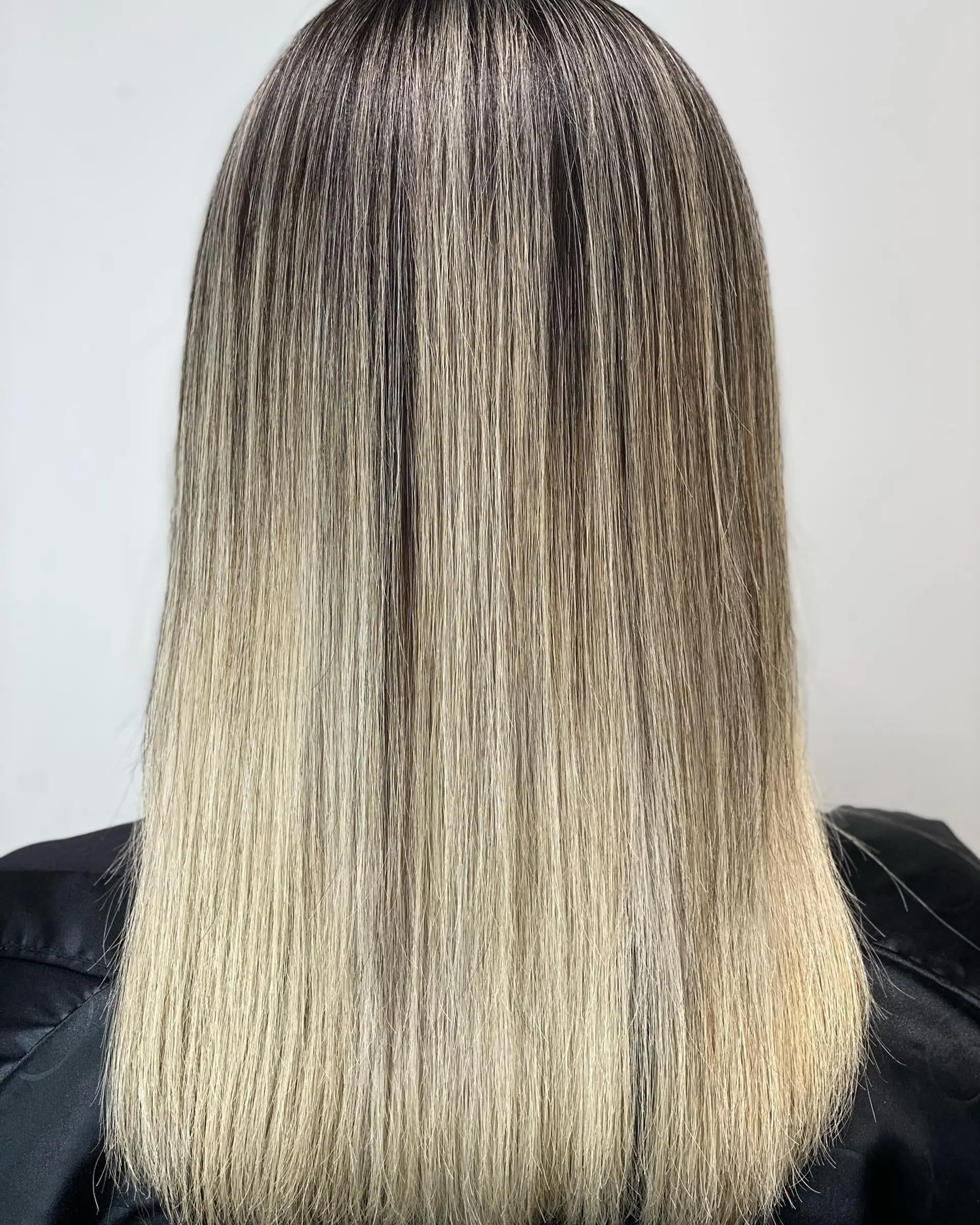 Long, straight hair with a seamless ombre color transition. 1
