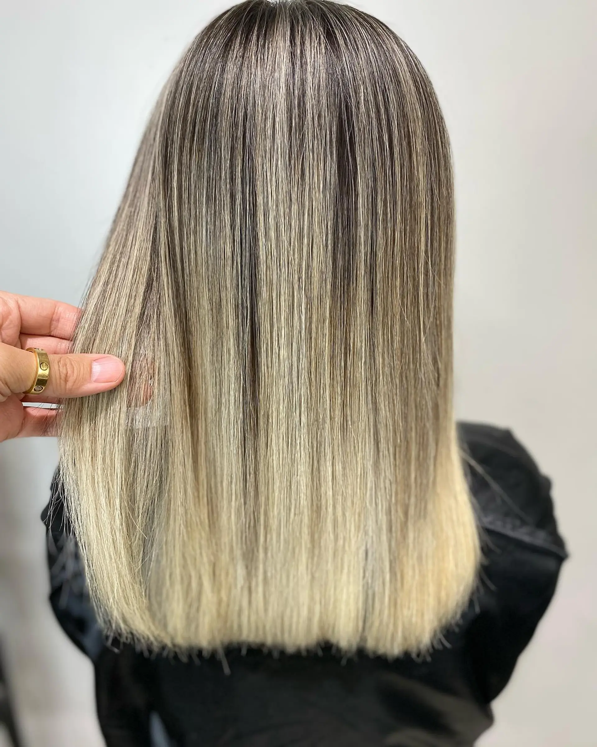 Long, straight hair with a seamless ombre color transition. 4