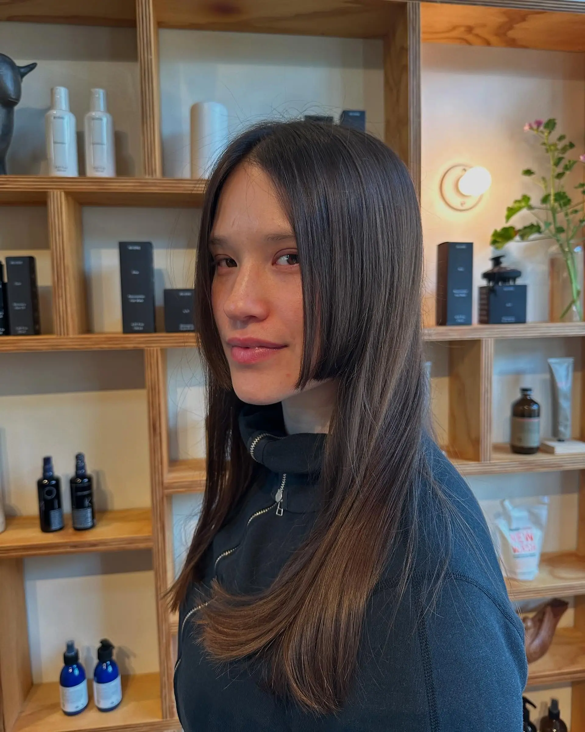 A modern dark brown long straight Hime cut with sharp, cheek-length blunt side strands. 1
