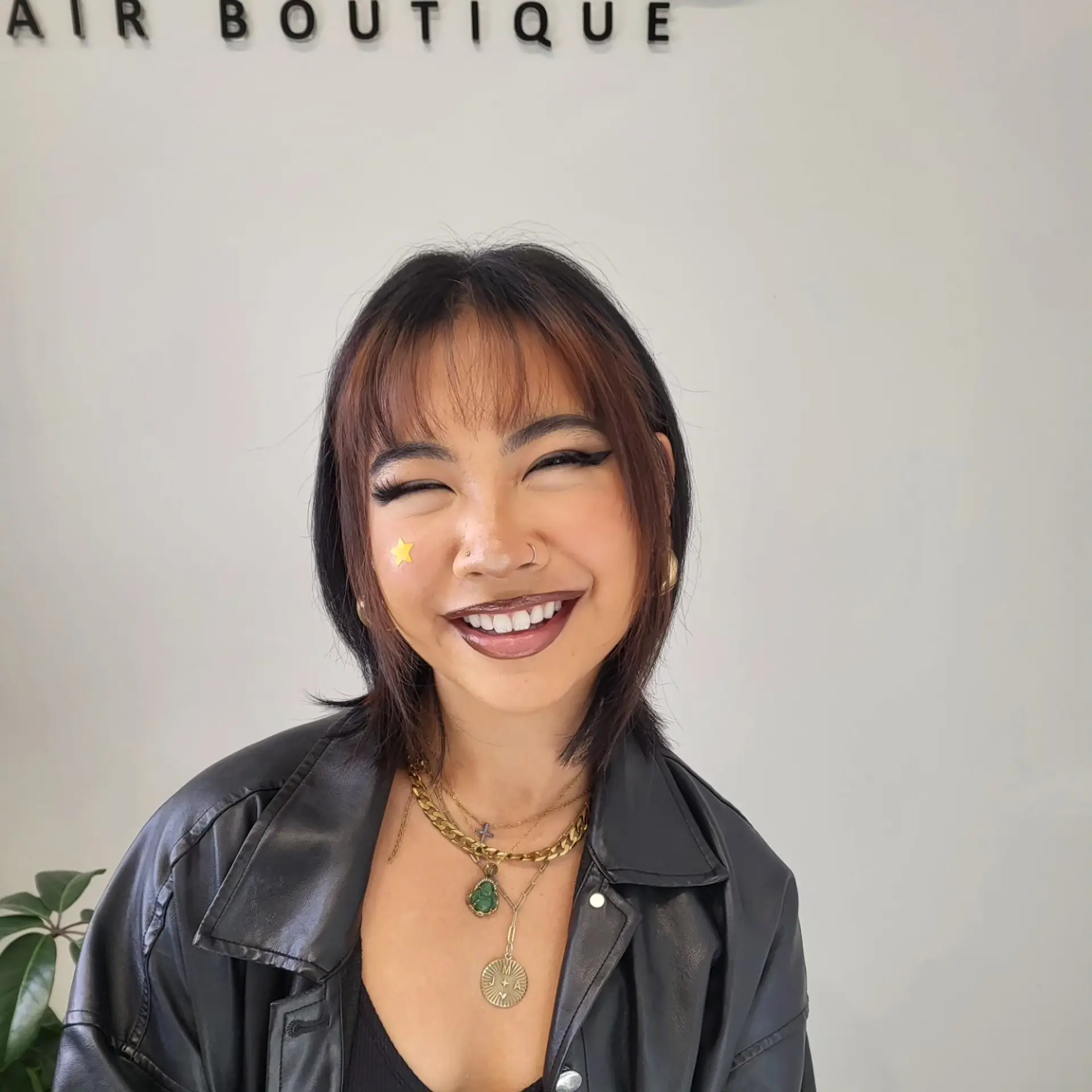 A textured short layered shag cut with soft face-framing pieces and wispy, see-through fringe bangs. 1
