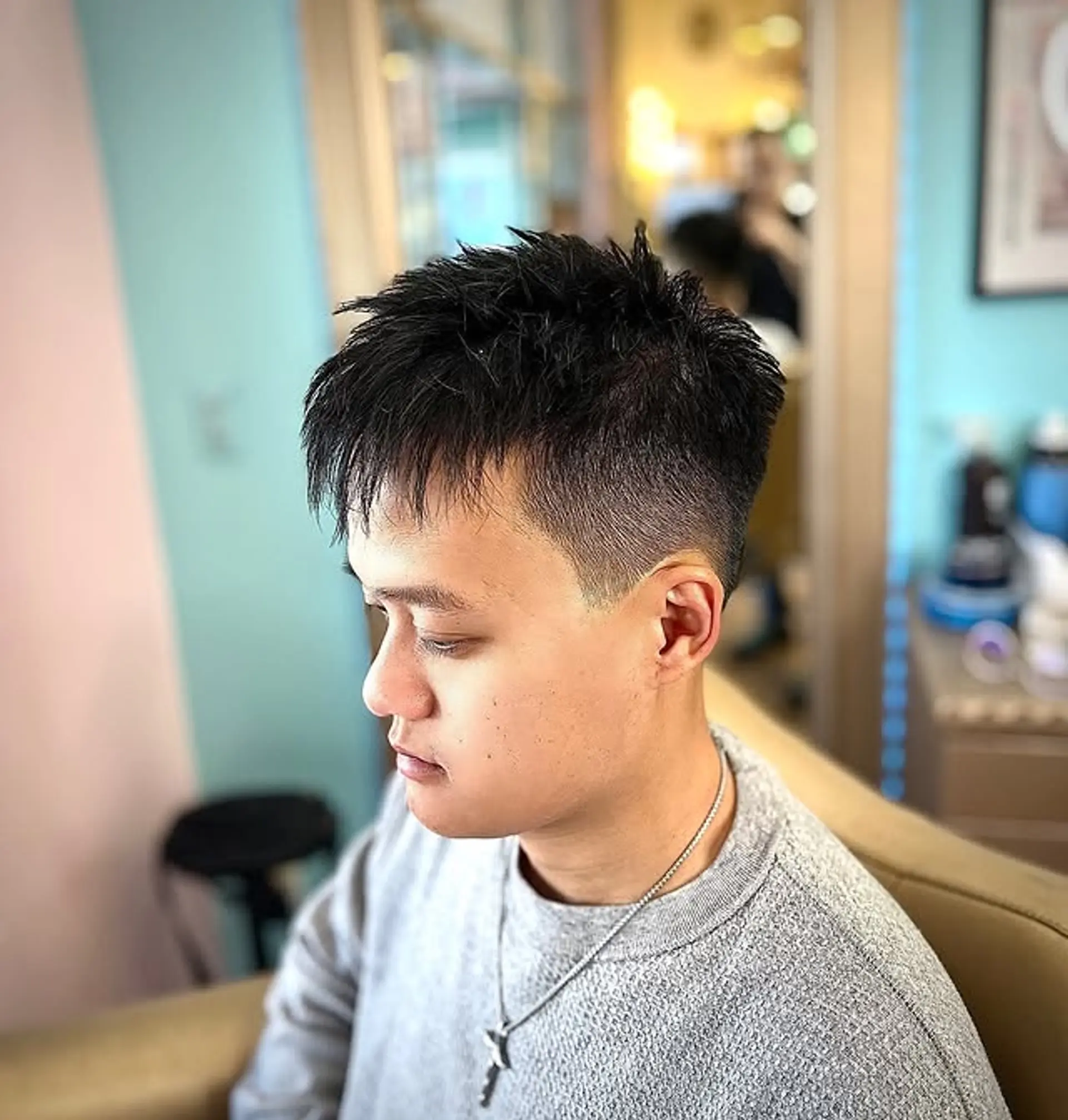 A short, textured crop with a clean fade. 1