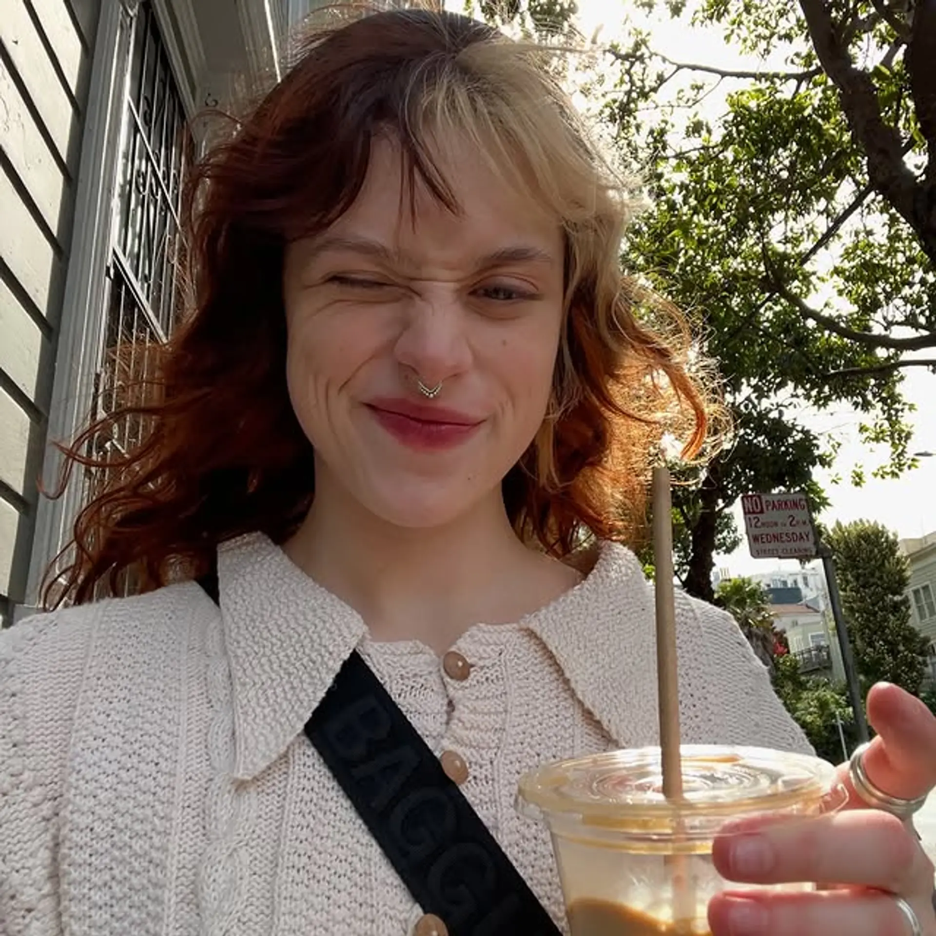 Medium-length wavy hair with a copper base and blonde split dye highlights. 1