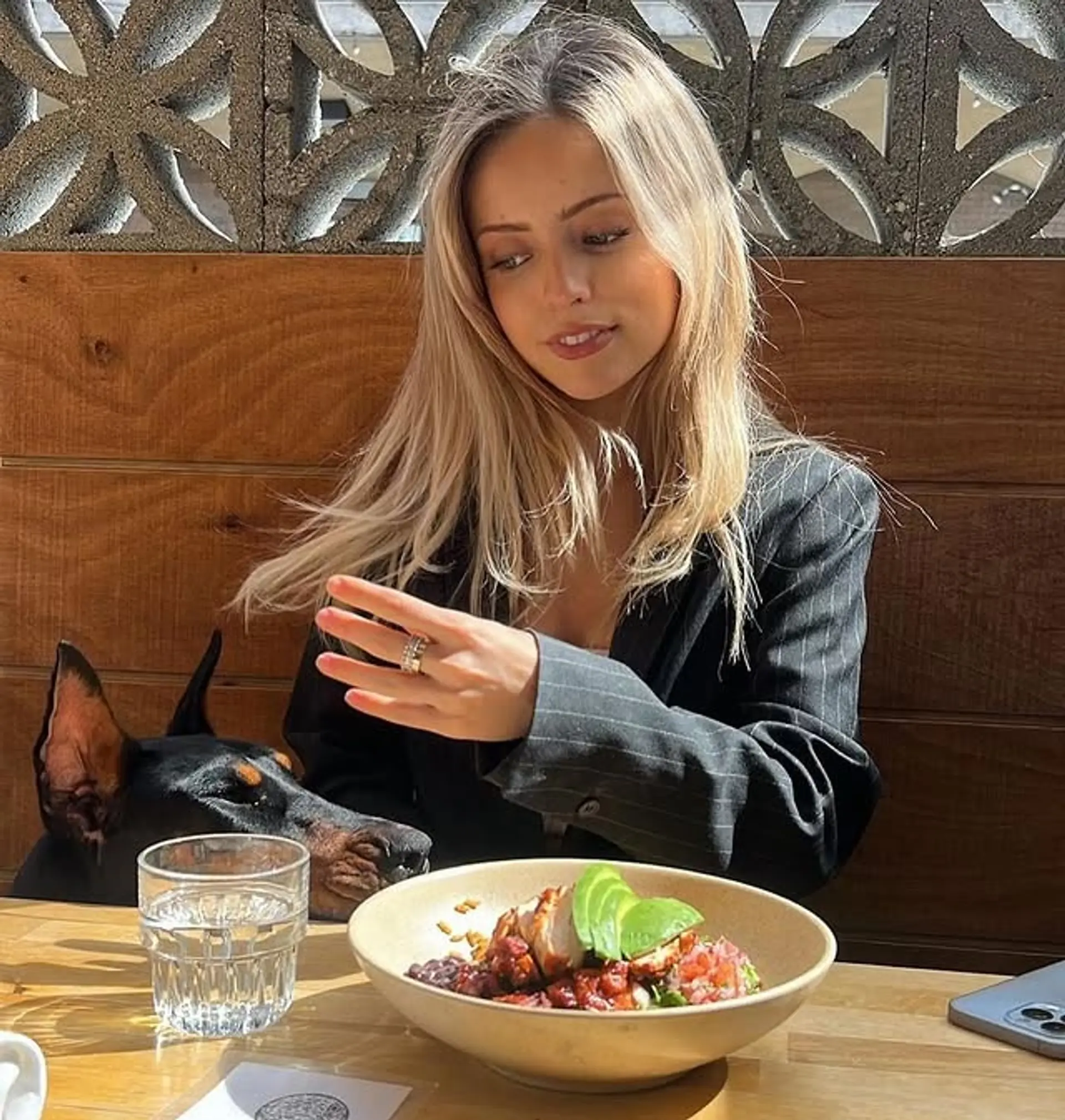 A medium-length layered haircut with soft, natural blonde tones. 1