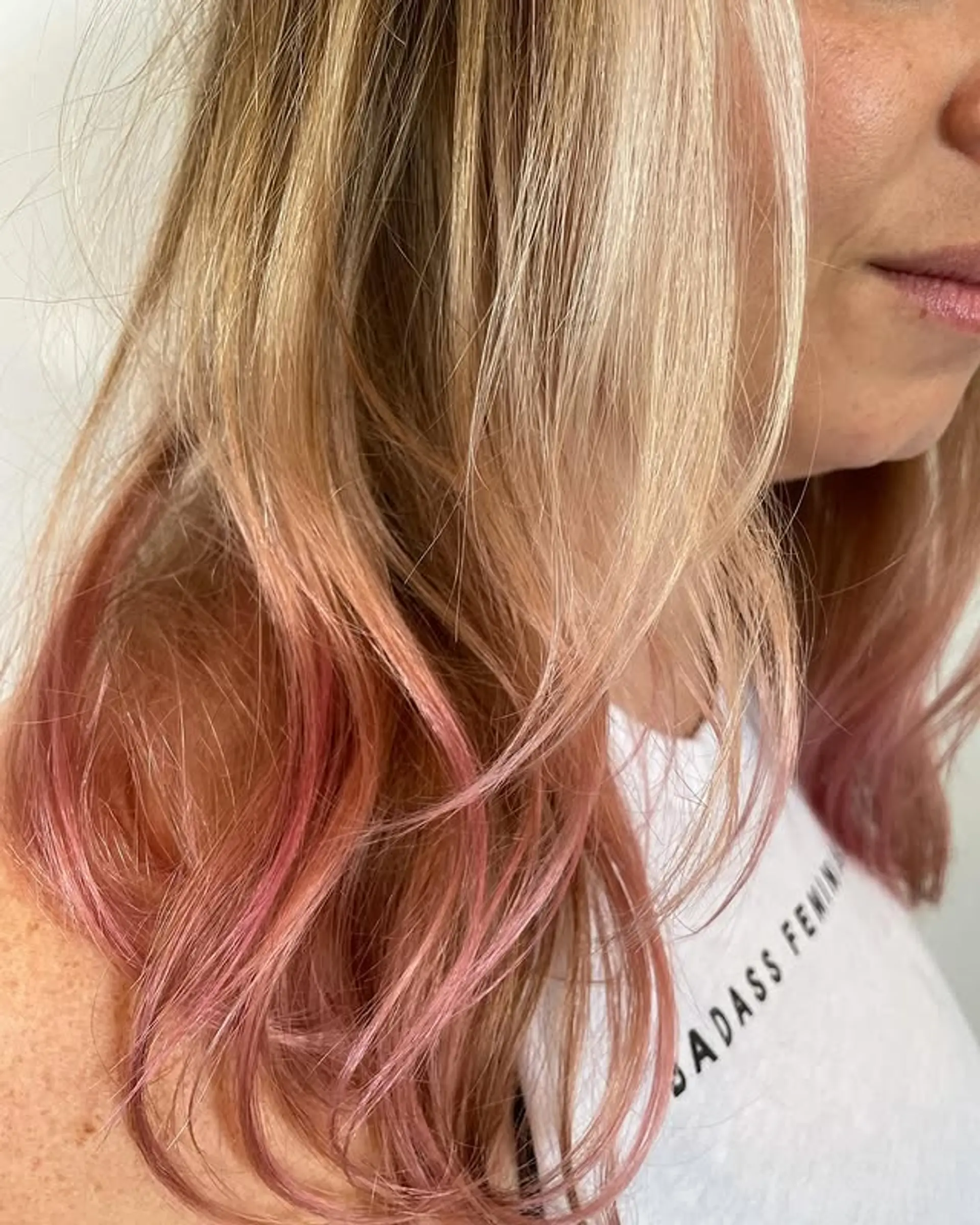 Medium length bronde hair with a rose gold dip dye. 1