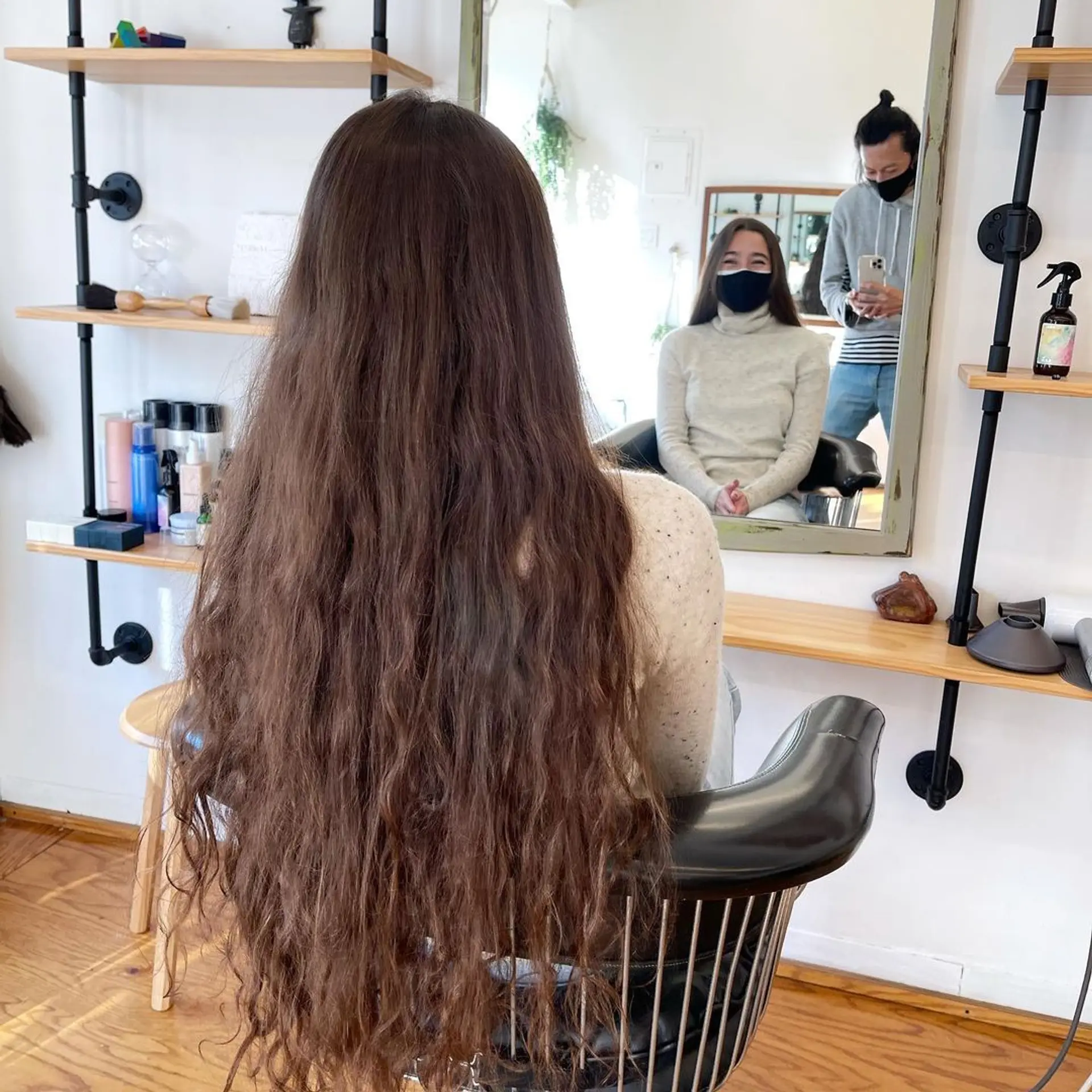 A 'Soft Waves Cascade' hairstyle featuring very long, light brown hair with loose, natural-looking waves, soft volume, and flowing layers, creating an effortlessly chic look with minimal styling. by @takeohair 4