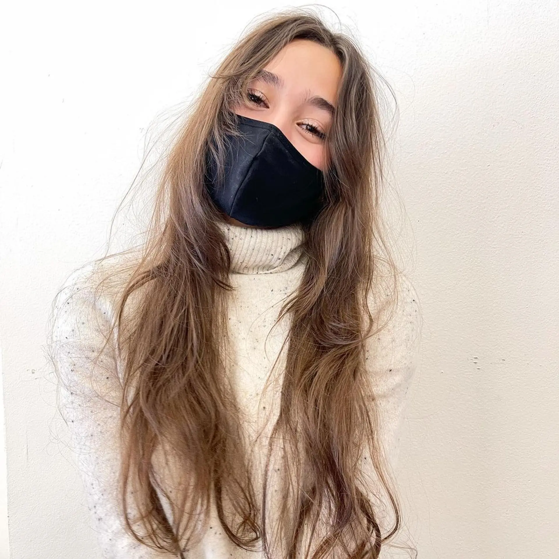 A 'Soft Waves Cascade' hairstyle featuring very long, light brown hair with loose, natural-looking waves, soft volume, and flowing layers, creating an effortlessly chic look with minimal styling. by @takeohair 6