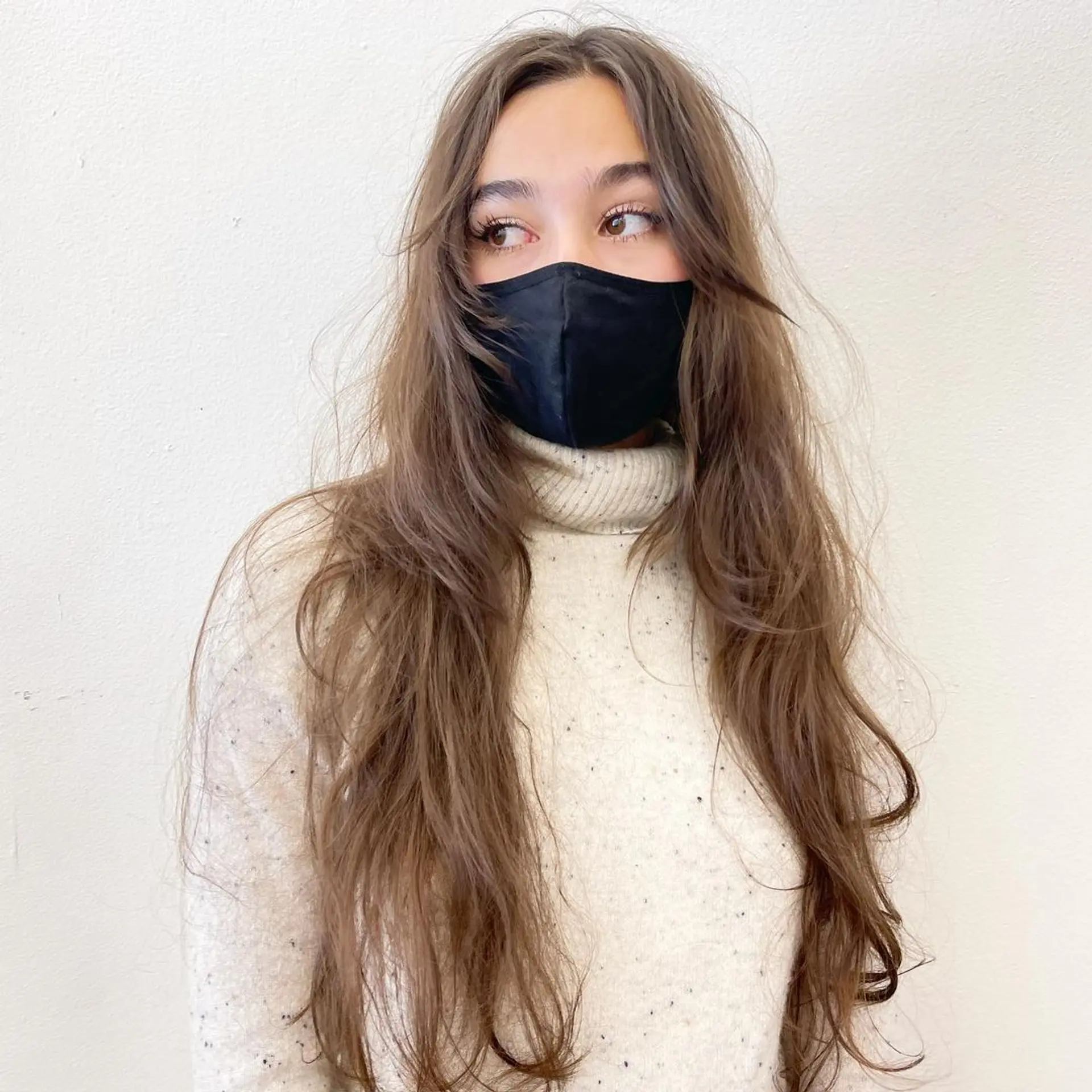 A 'Soft Waves Cascade' hairstyle featuring very long, light brown hair with loose, natural-looking waves, soft volume, and flowing layers, creating an effortlessly chic look with minimal styling. by @takeohair 2