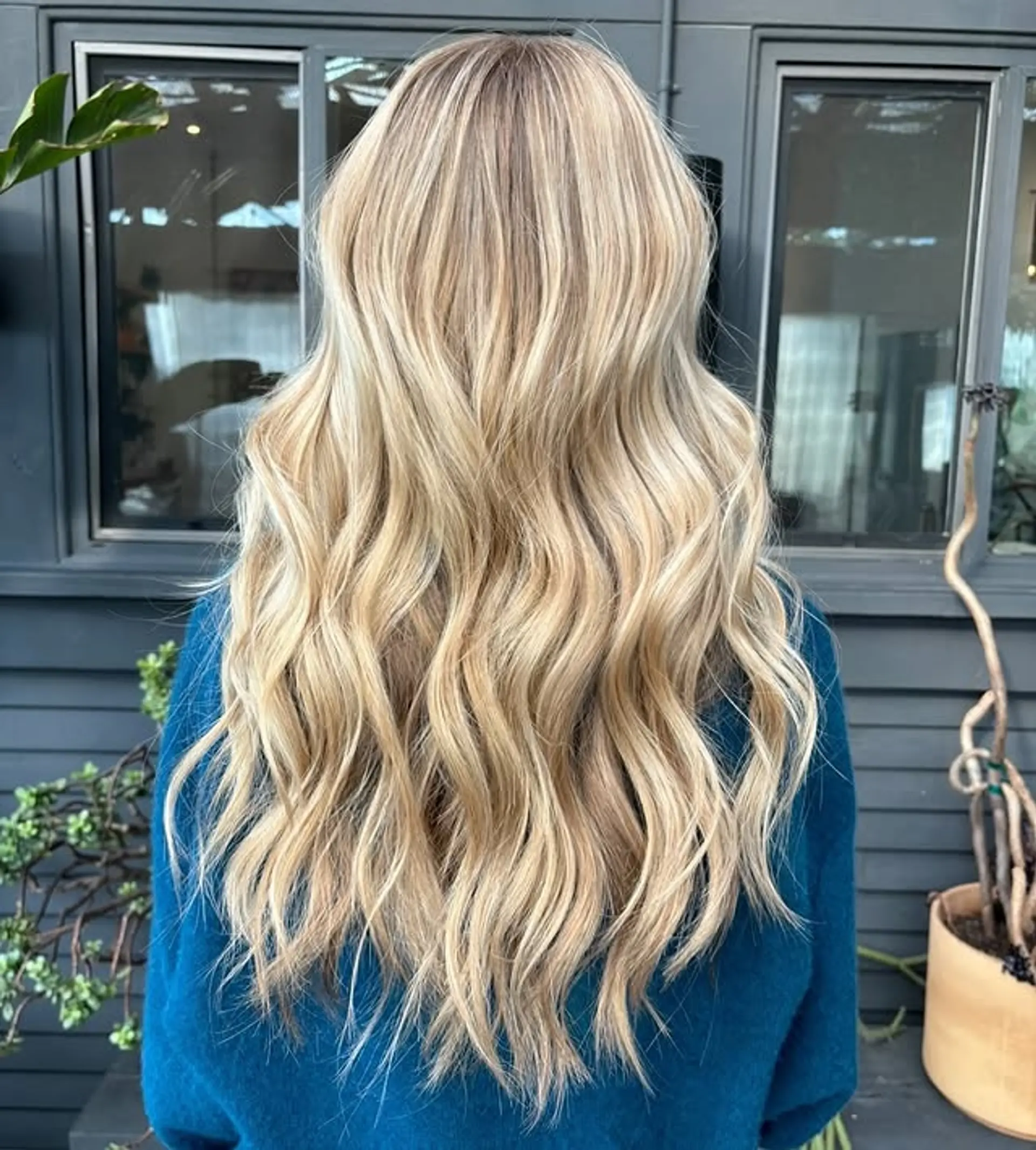 Long, soft waves with a cream blonde balayage. 1