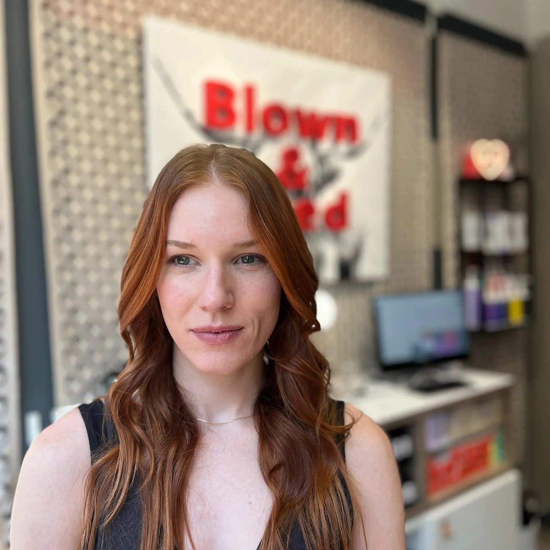 Long, wavy auburn-copper hair with subtle balayage highlights and face-framing layers. 1