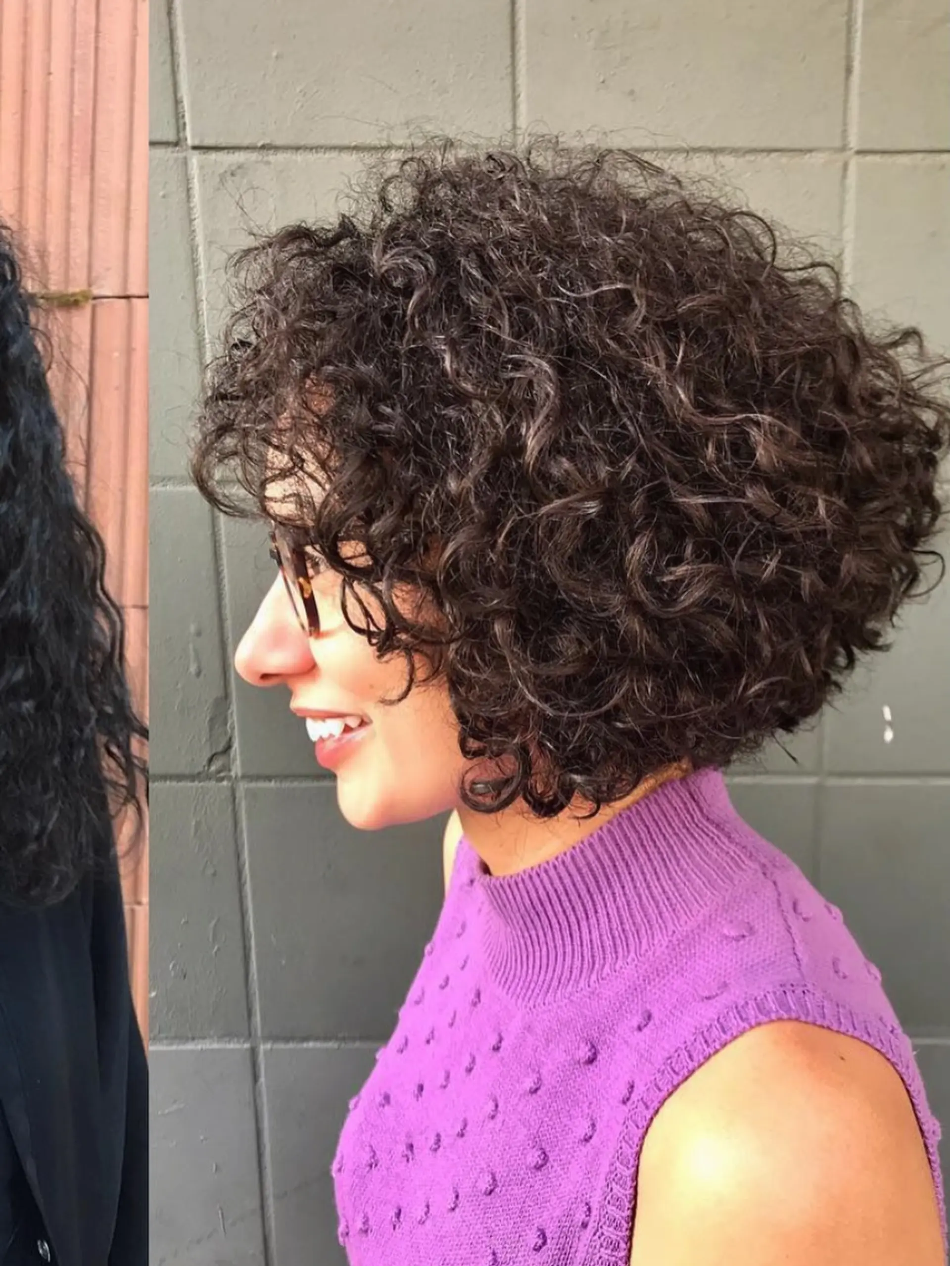 A voluminous, rounded curly bob haircut featuring soft curly bangs that frame the face. 1